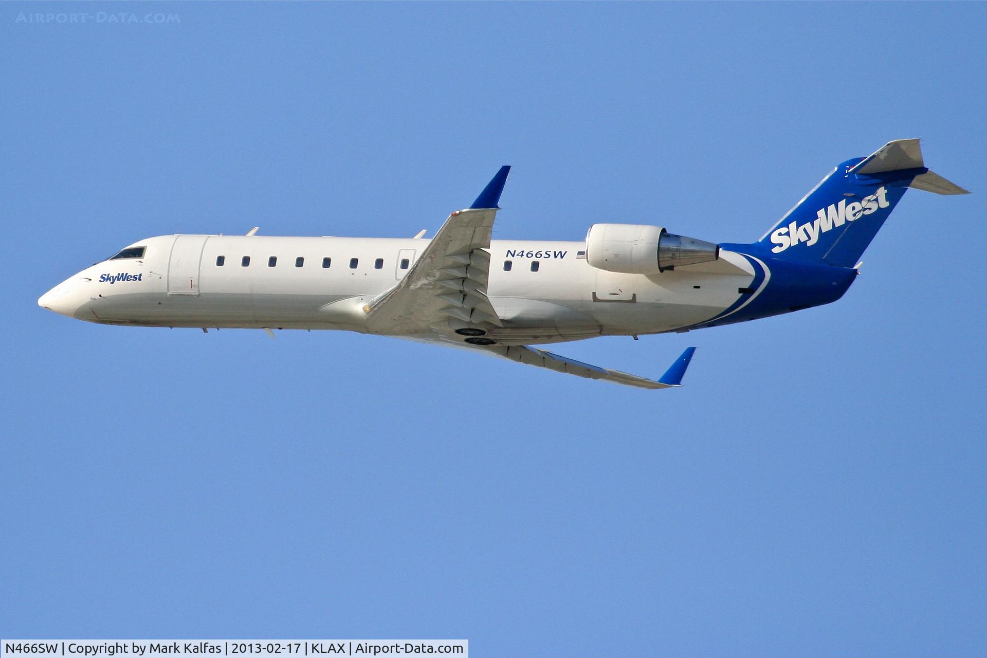 N466SW, 2003 Bombardier CRJ-200ER (CL-600-2B19) C/N 7856, SkyWest CRJ7, N466SW separating 25R KLAX