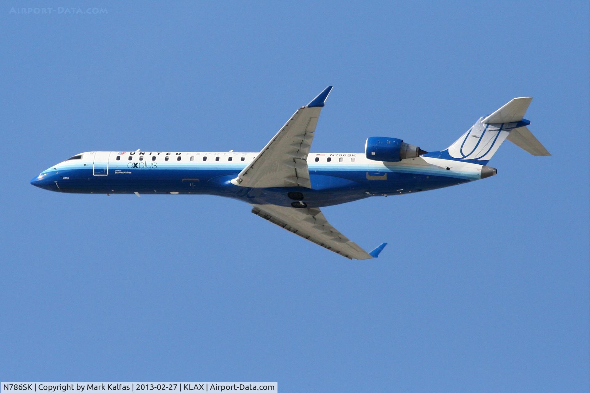 N786SK, 2009 Bombardier CRJ-700 (CL-600-2C10) Regional Jet C/N 10286, SkyWest/ United Express CRJ7, N786SK departing 25R KLAX