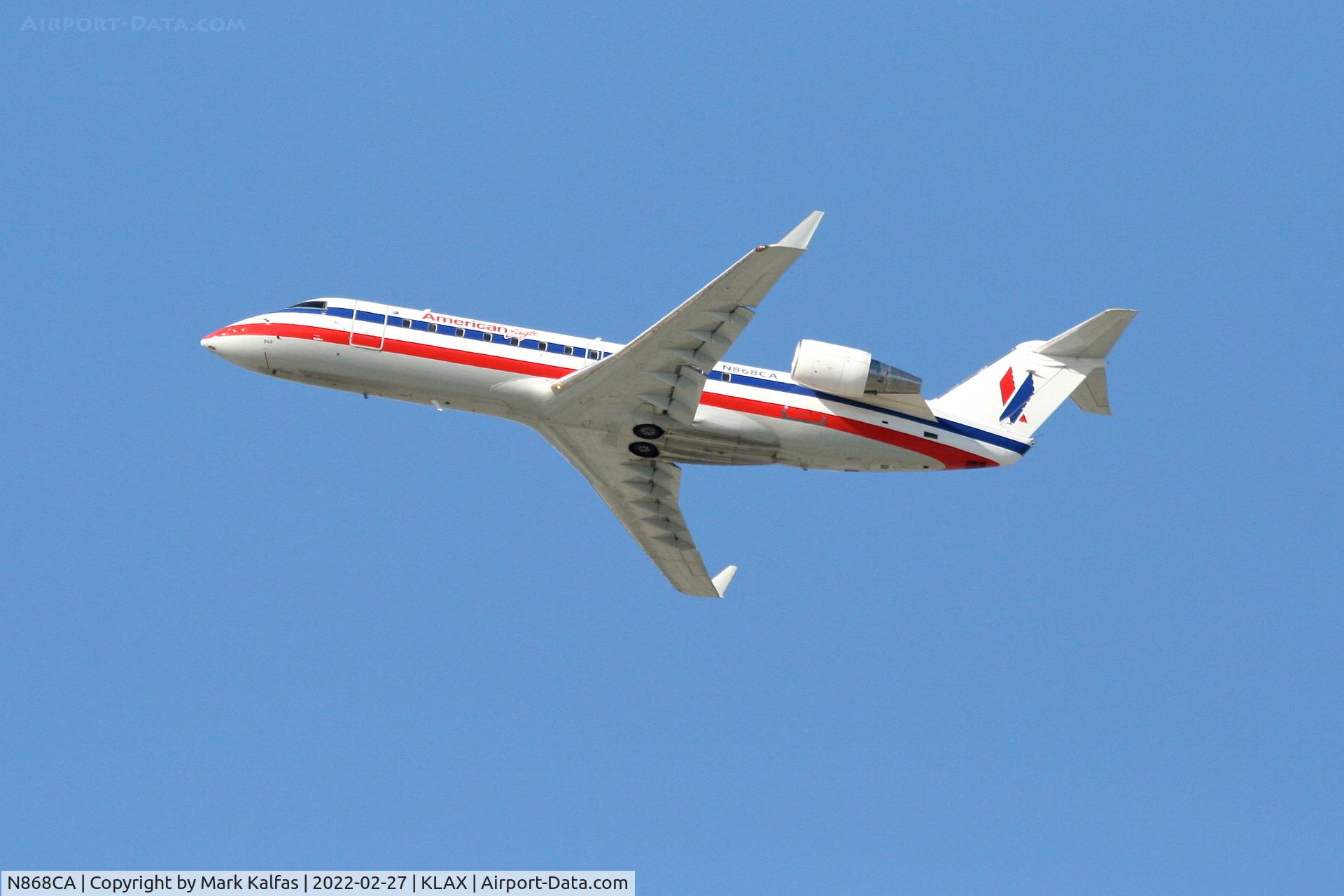 N686CA, 1980 Boeing 727-2S7 C/N 22021, American Eagle CRJ1, N868CA at LAX