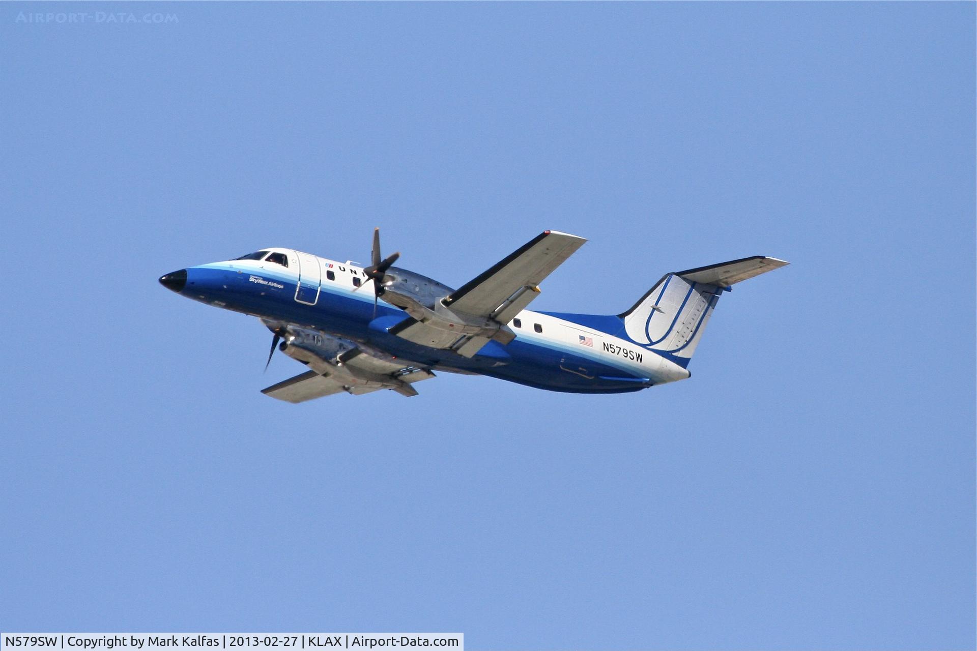 N579SW, 1998 Embraer EMB-120ER Brasilia C/N 120347, SkyWest E120, N579SW departing 25R LAX