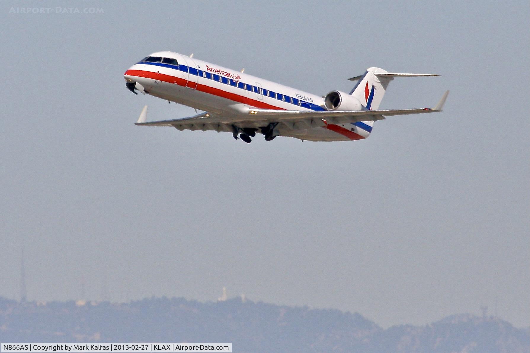 N866AS, 2001 Bombardier CRJ-200ER (CL-600-2B19) C/N 7517, American Eagle CRJ2, N866AS departing 25R KLAX