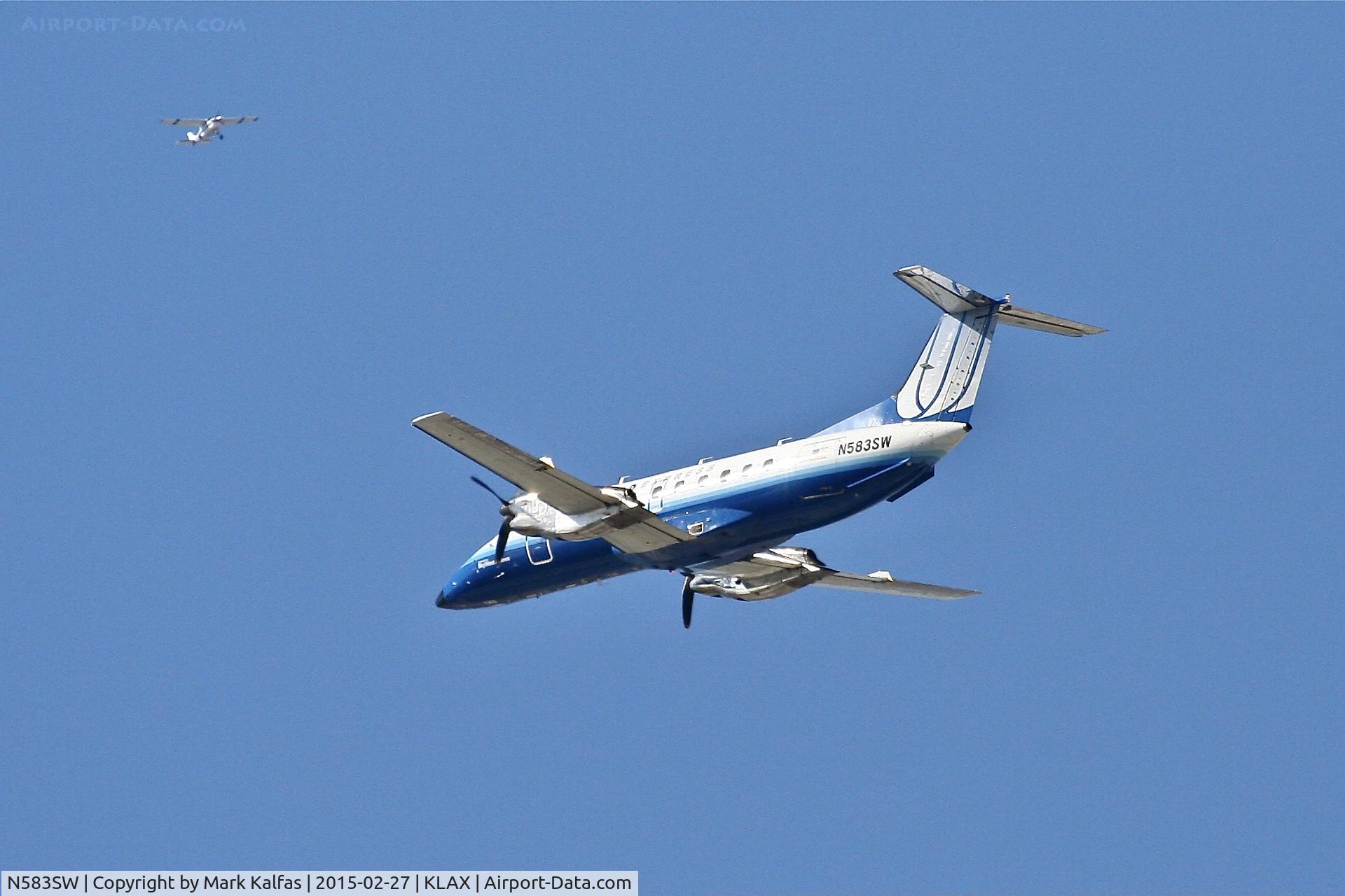 N583SW, 1999 Embraer EMB-120ER Brasilia C/N 120351, SkyWest E120, N583SW, departing 25R LAX