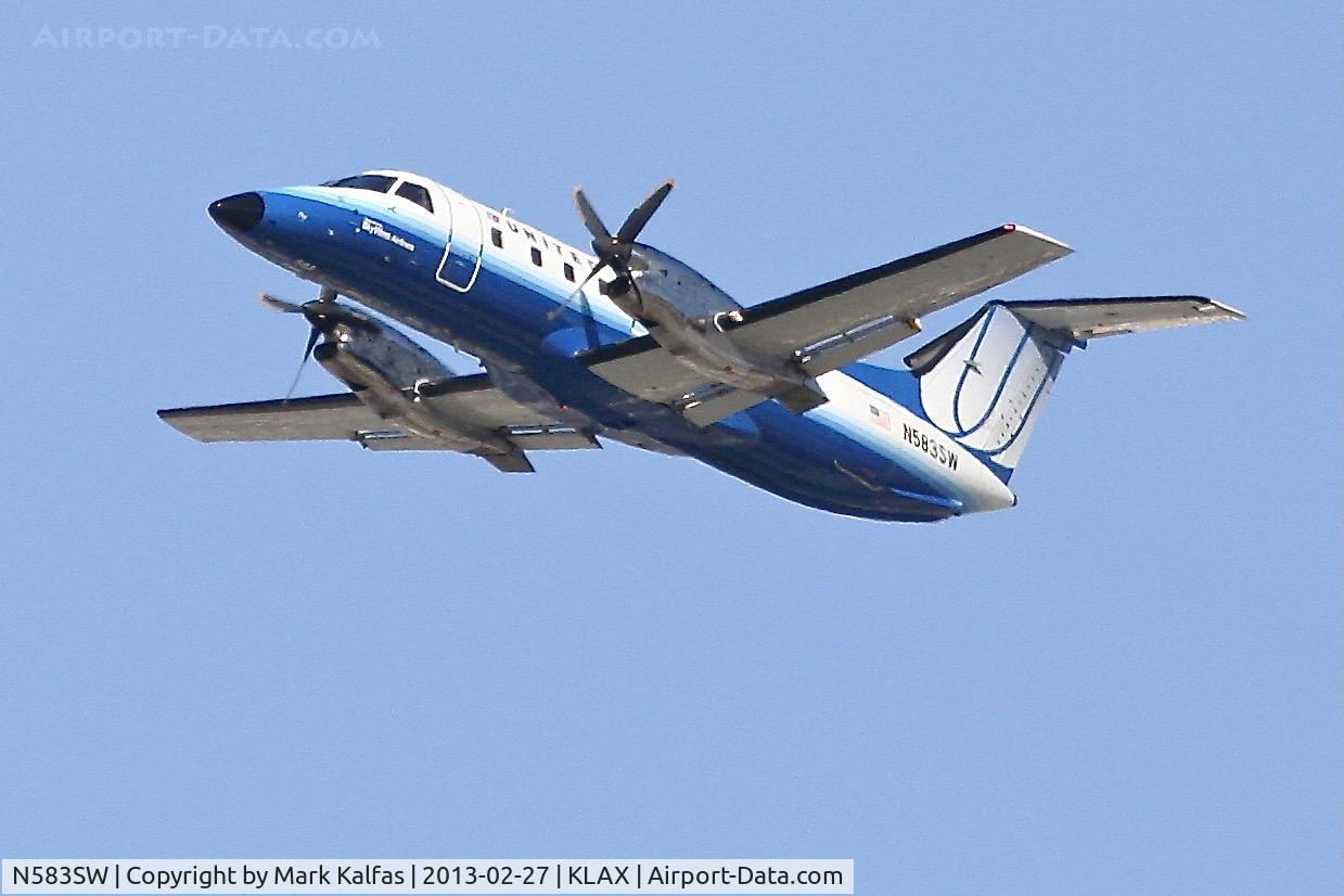 N583SW, 1999 Embraer EMB-120ER Brasilia C/N 120351, SkyWest E120, N583SW, departing 25R LAX