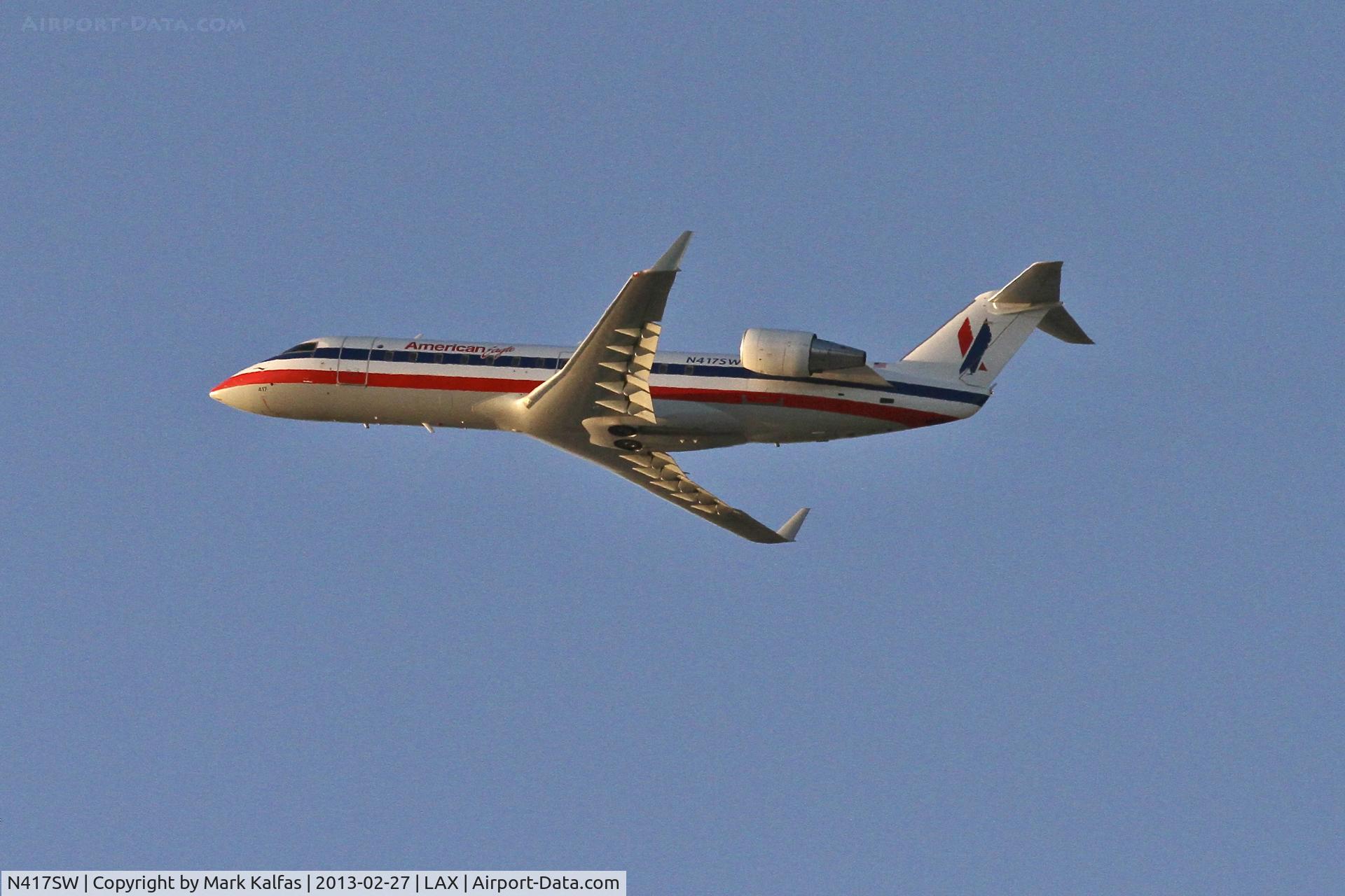 N417SW, 2000 Bombardier CRJ-200LR (CL-600-2B19) C/N 7400, American Eagle CRJ2, N417SW departing 25R LAX