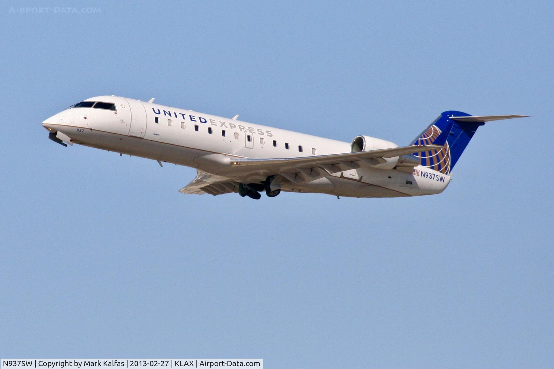 N937SW, 2003 Bombardier CRJ-200LR (CL-600-2B19) C/N 7735, SkyWest CRJ2, N937SW departing 25R LAX