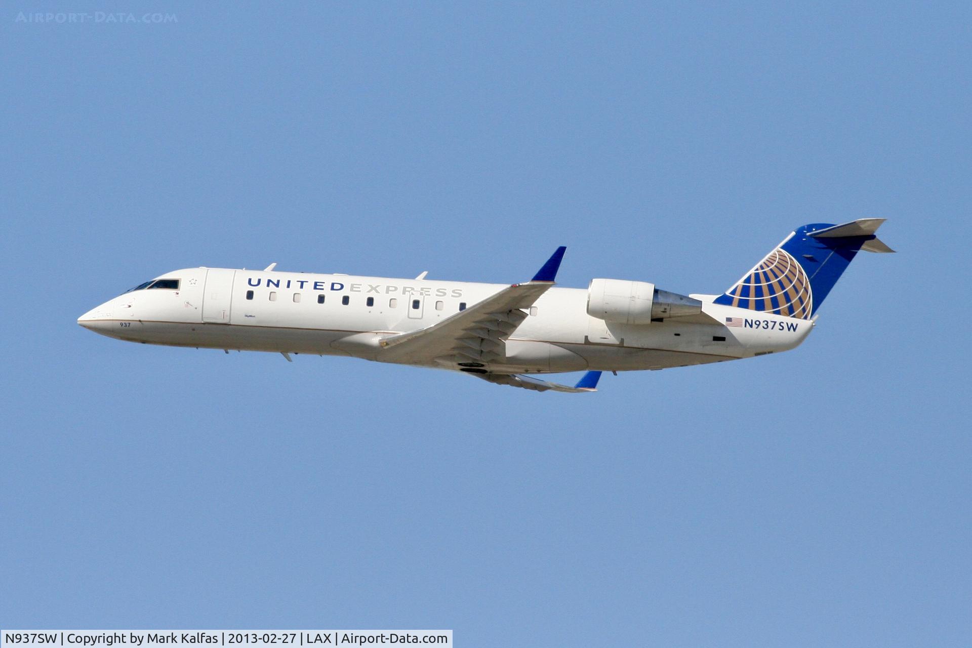 N937SW, 2003 Bombardier CRJ-200LR (CL-600-2B19) C/N 7735, SkyWest CRJ2, N937SW departing 25R LAX