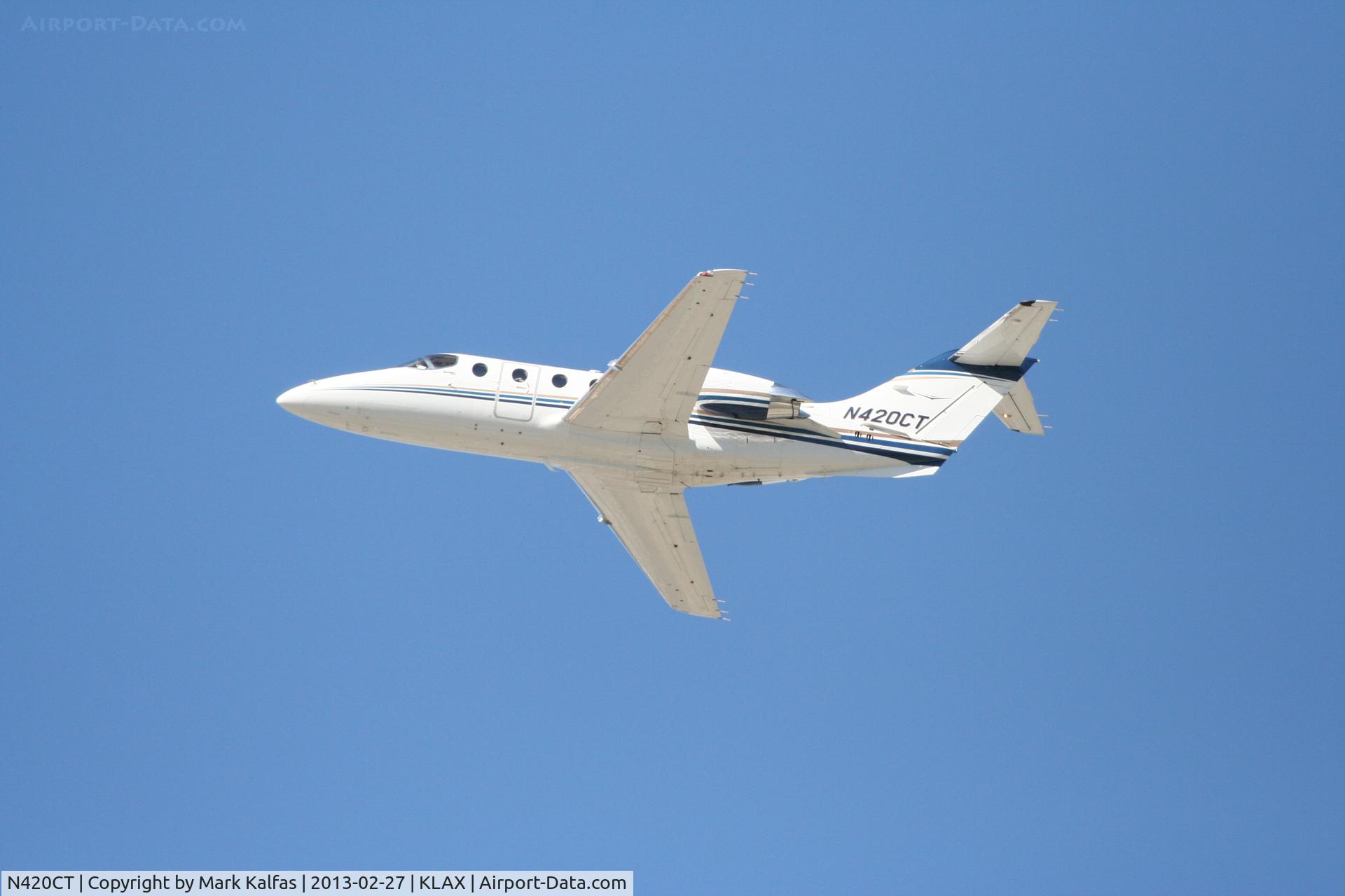 N420CT, 2007 Raytheon Beechjet 400A C/N RK-517, Raytheon Beechjet 400A, N420CT departing 25L LAX