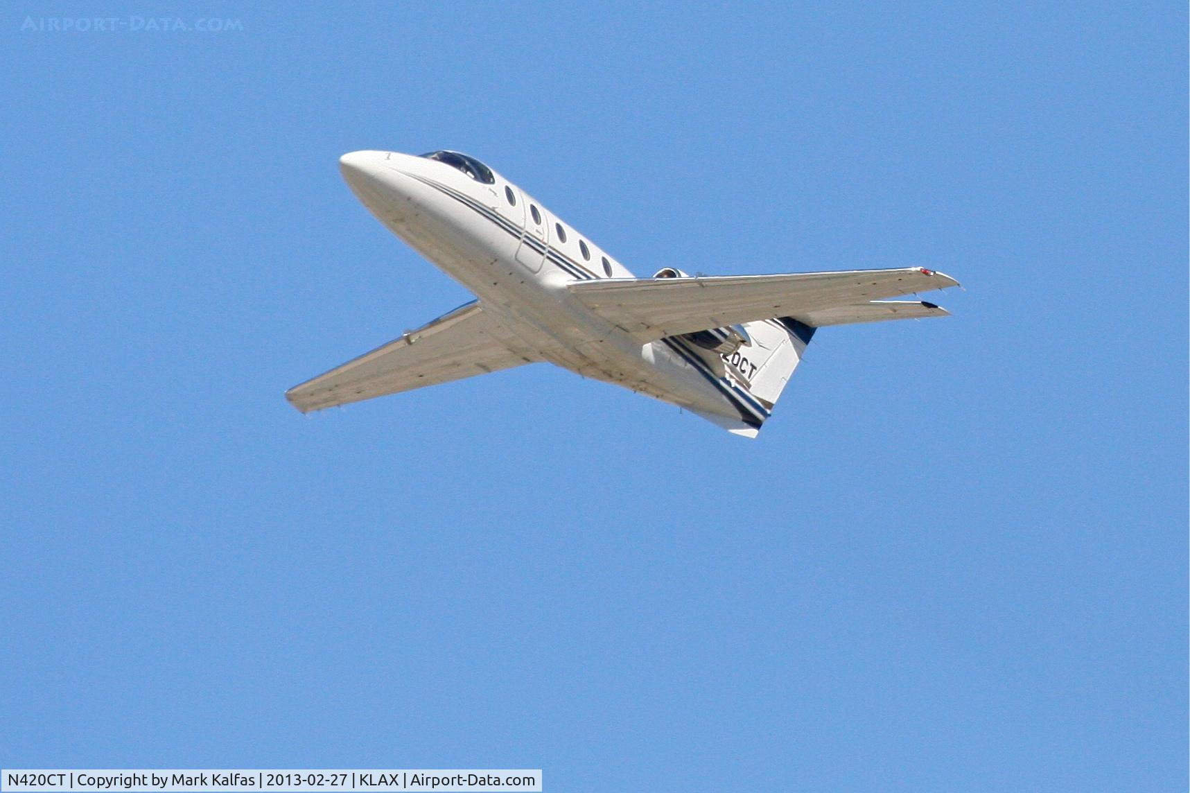 N420CT, 2007 Raytheon Beechjet 400A C/N RK-517, Raytheon Beechjet 400A, N420CT departing 25L LAX