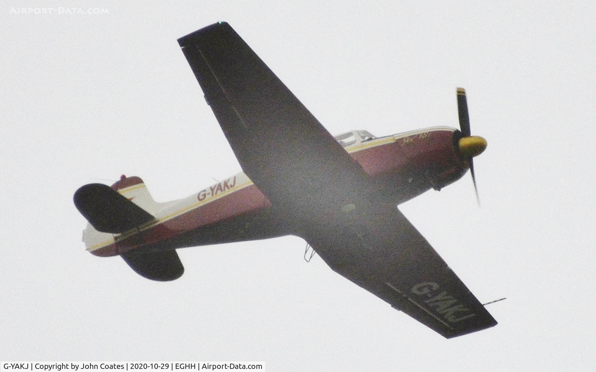 G-YAKJ, 1993 Yakovlev Yak-18T C/N 12055, Flypast in bad weather