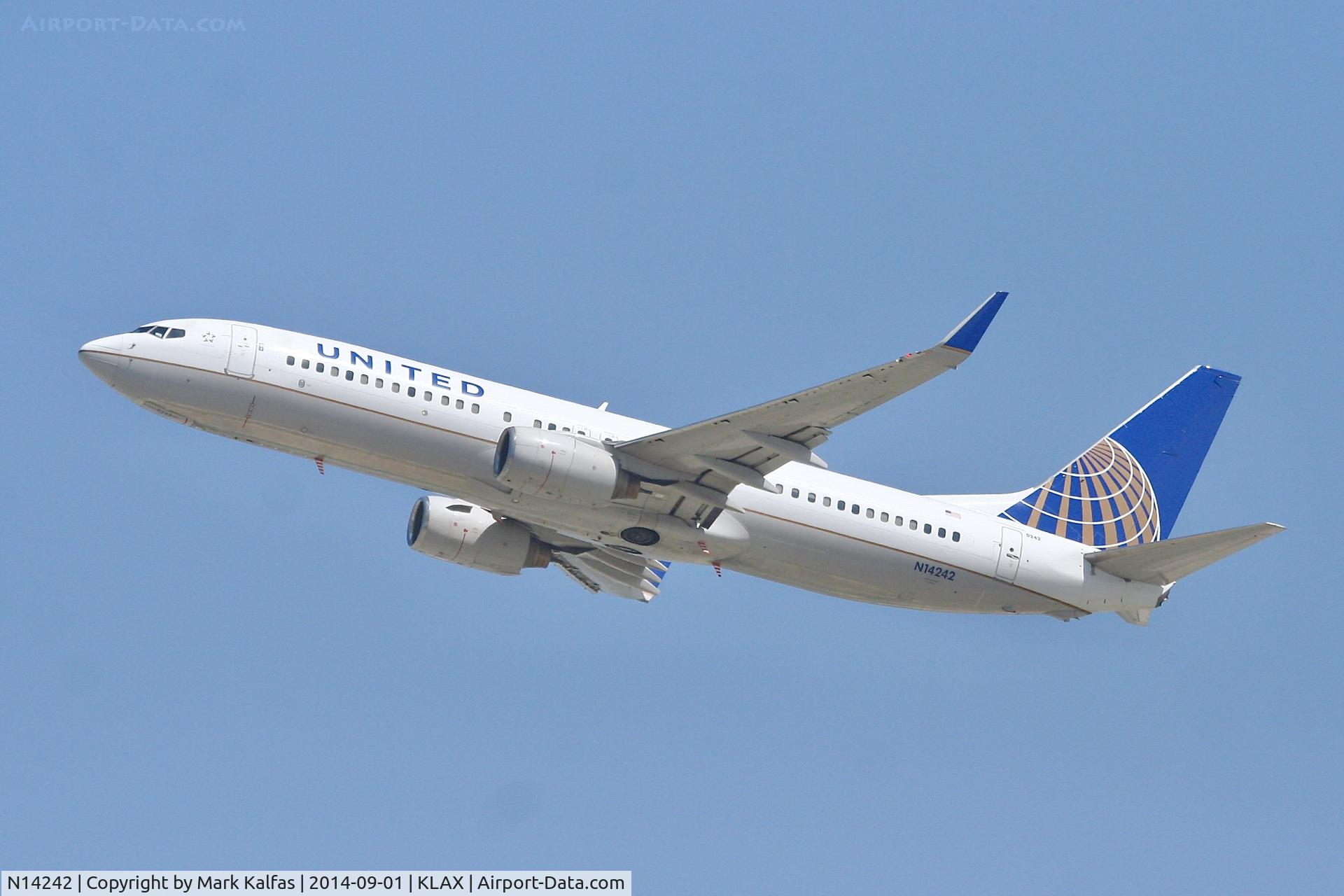 N14242, 1999 Boeing 737-824 C/N 28805, United Boeing 737-824, N14242 departing 25R LAX