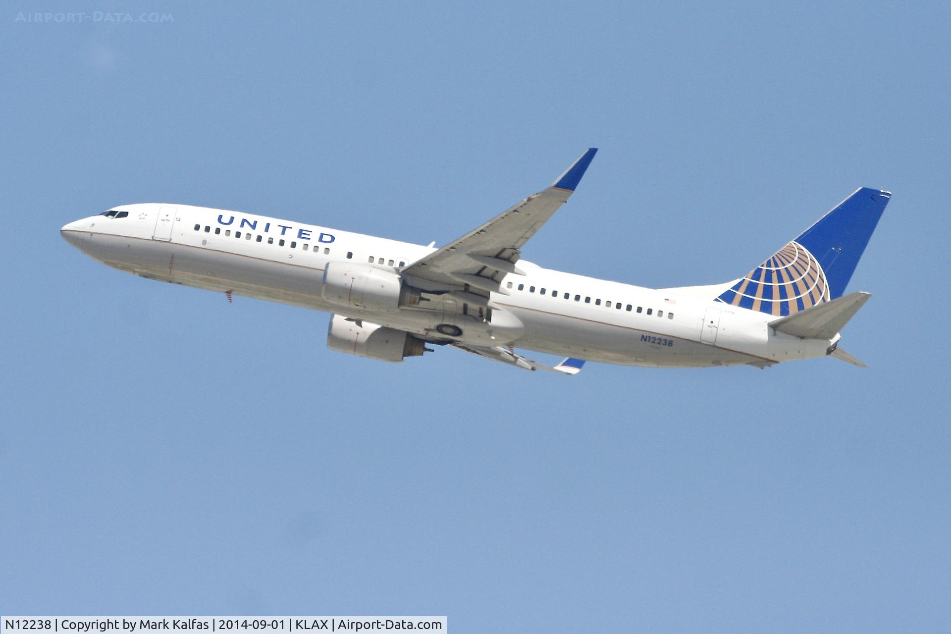N12238, 1999 Boeing 737-824 C/N 28804, United Boeing 737-824, N12238 departing 25R LAX