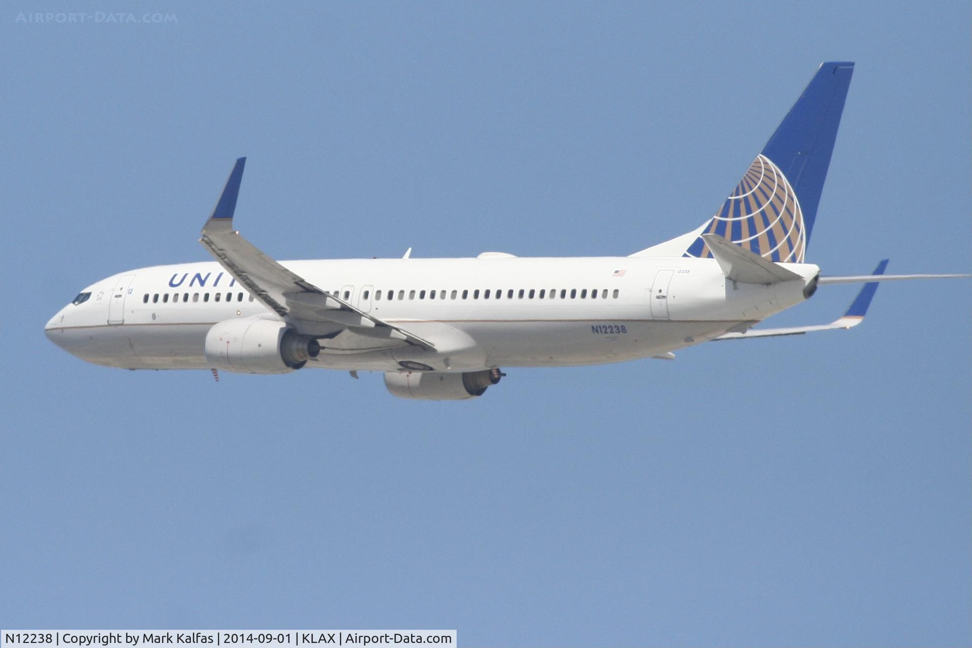 N12238, 1999 Boeing 737-824 C/N 28804, United Boeing 737-824, N12238 departing 25R LAX