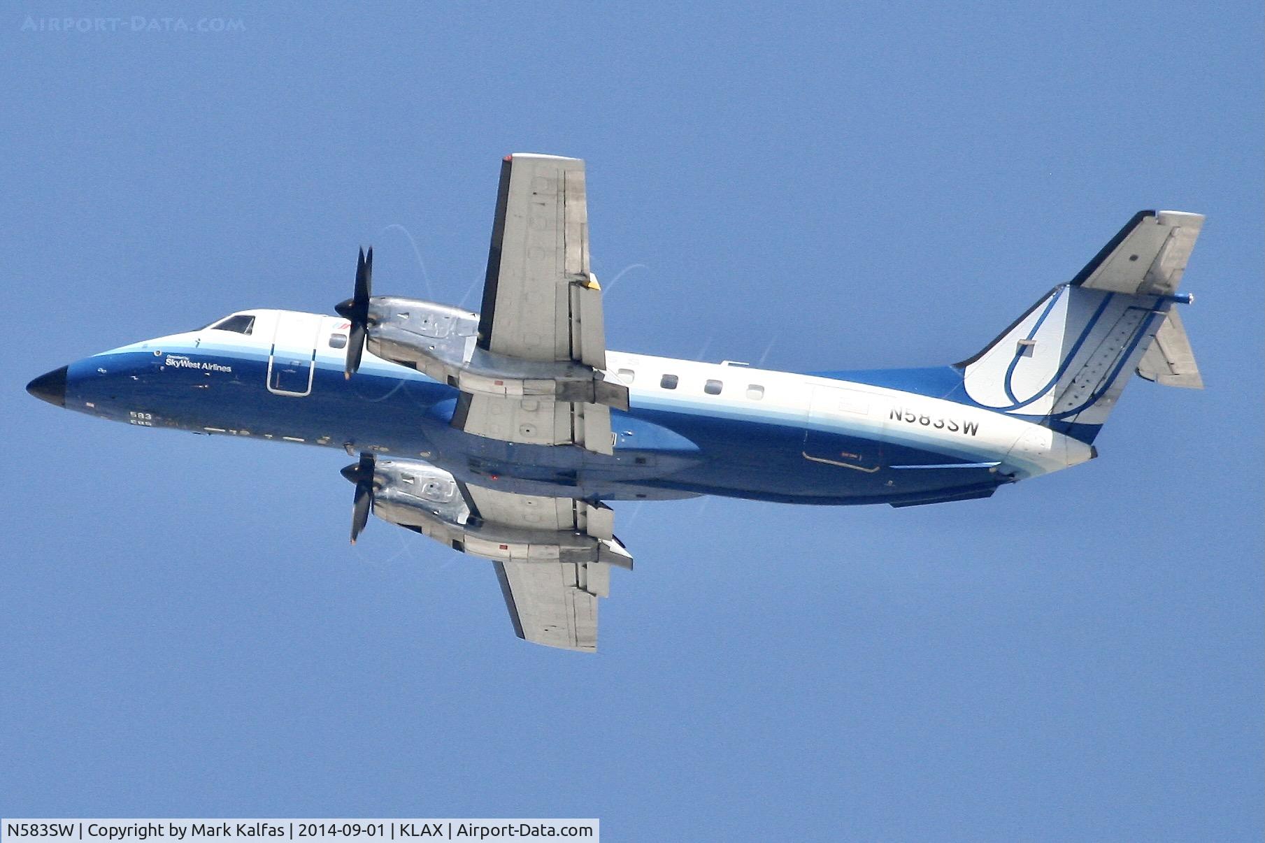 N583SW, 1999 Embraer EMB-120ER Brasilia C/N 120351, SkyWest E120, N583SW, departing 25R LAX