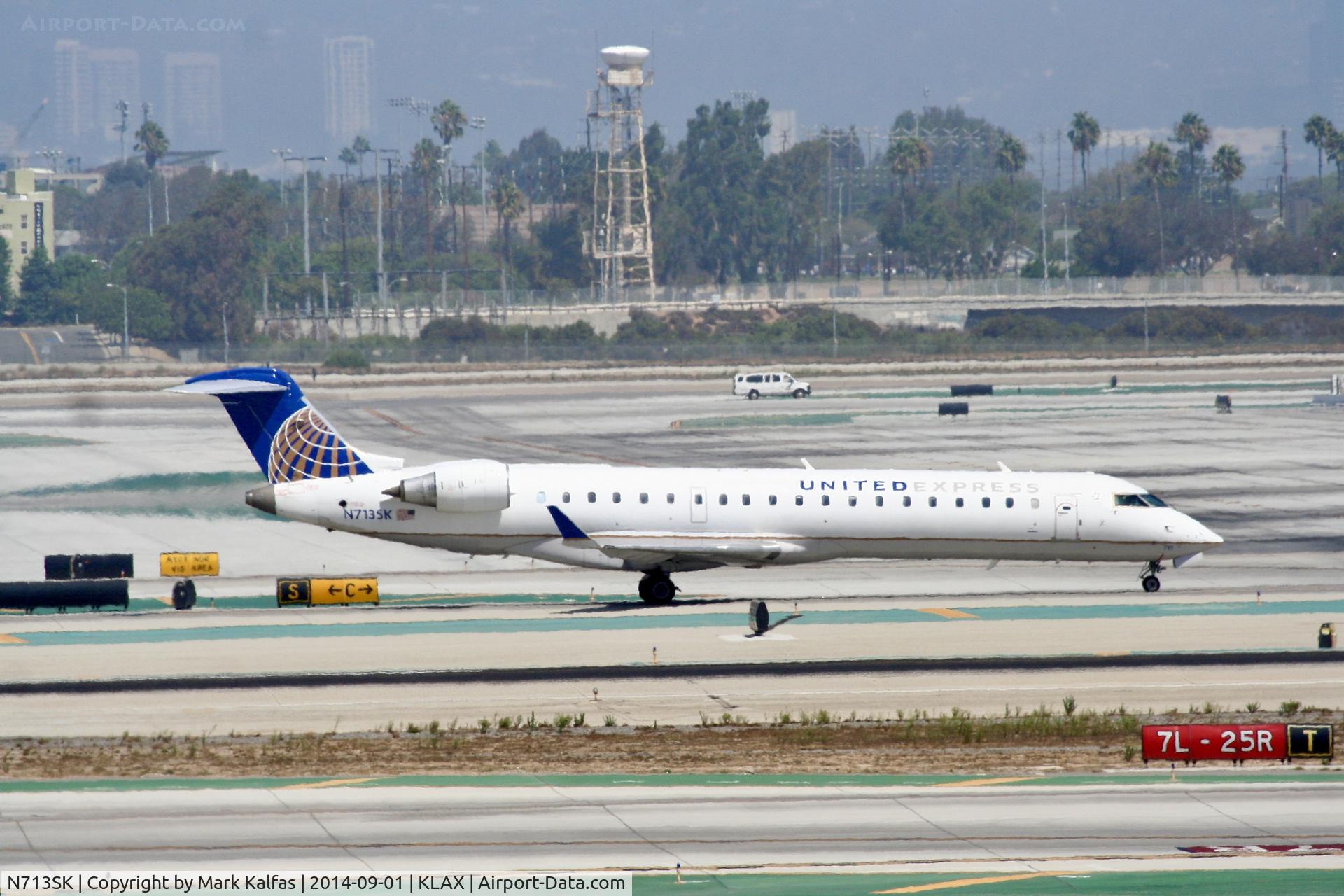 N713SK, 2004 Bombardier CRJ-701ER (CL-600-2C10) Regional Jet C/N 10174, SkyWest/United Express Bombardier CRJ-701ER N713SK at LAX