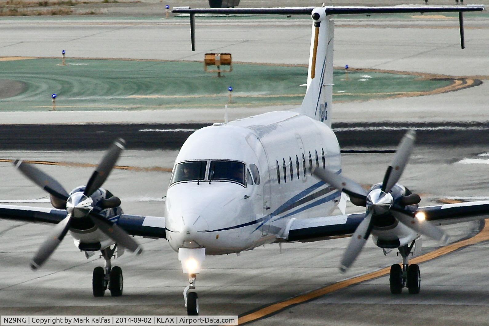 N29NG, 1997 Beech 1900D C/N UE-303, Northrop Grumman, Raytheon Aircraft Company 1900D on TWY T, crossing RWY 25L KLAX.