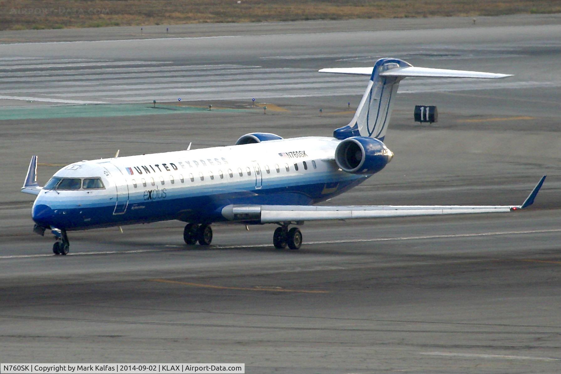 N760SK, 2005 Bombardier CRJ-701ER (CL-600-2C10) Regional Jet C/N 10223, SkyWest/United Express Bombardier CRJ-701ER, N760SK taxiing to 25R LAX