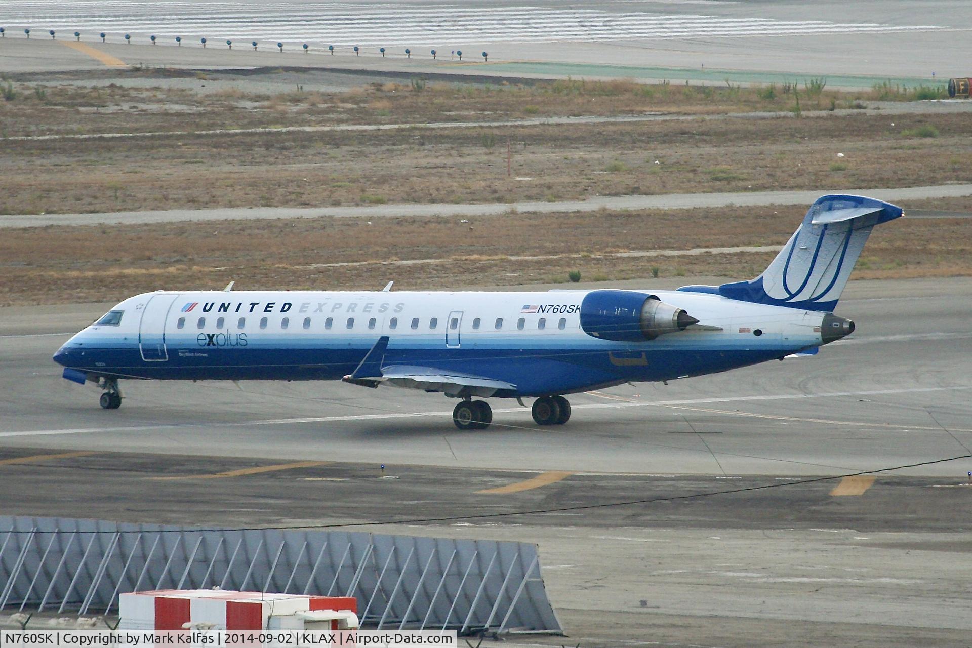 N760SK, 2005 Bombardier CRJ-701ER (CL-600-2C10) Regional Jet C/N 10223, SkyWest/United Express Bombardier CRJ-701ER, N760SK taxiing to 25R LAX