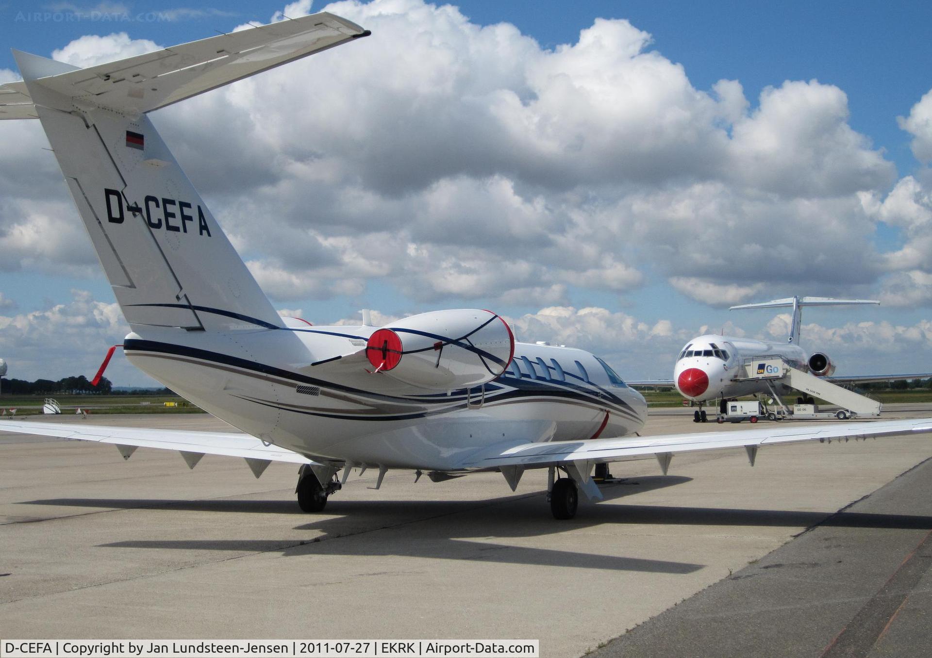 D-CEFA, 2011 Cessna 525C CitationJet CJ4 C/N 525C-0044, CitationJet D-CEFA seen on Roskilde Airport apron with MD-83  OY-RUE in the background.