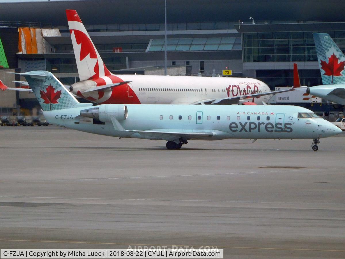 C-FZJA, 2004 Bombardier CRJ-200ER (CL-600-2B19) C/N 7988, At Trudeau International