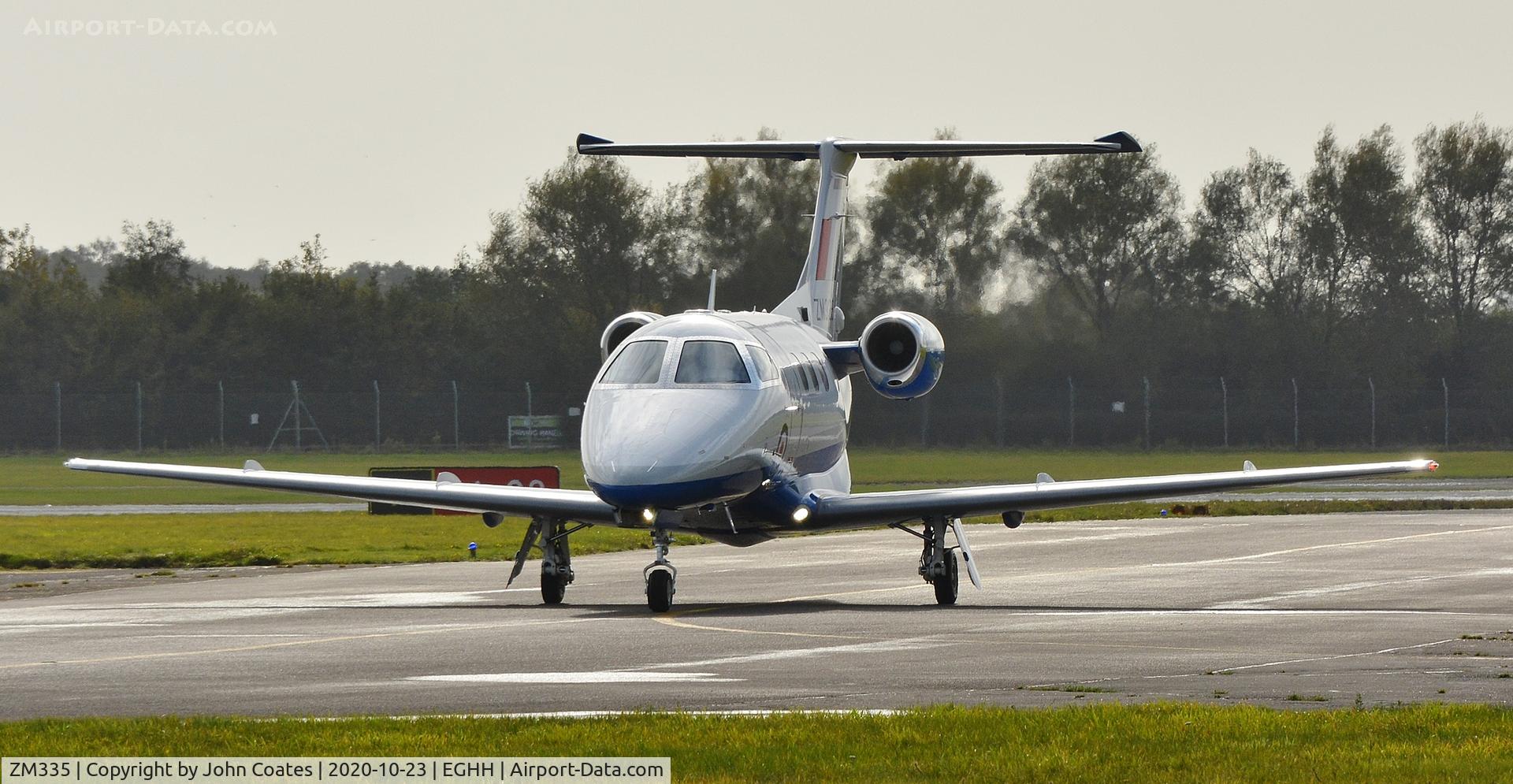 ZM335, 2017 Embraer EMB-500 Phenom 100 C/N 50000380, Taxiing on arrival