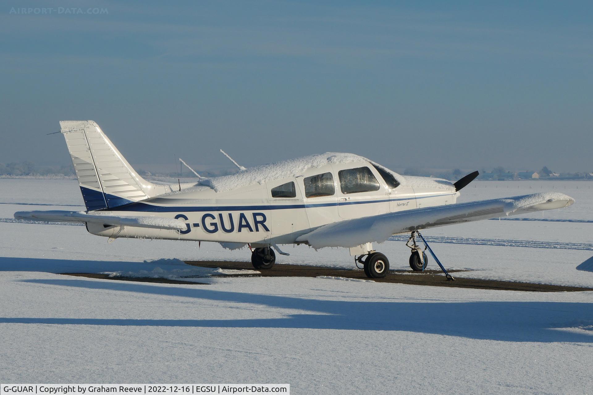 G-GUAR, 1978 Piper PA-28-161 Warrior II C/N 28-7816576, Parked at Duxford in the snow.
