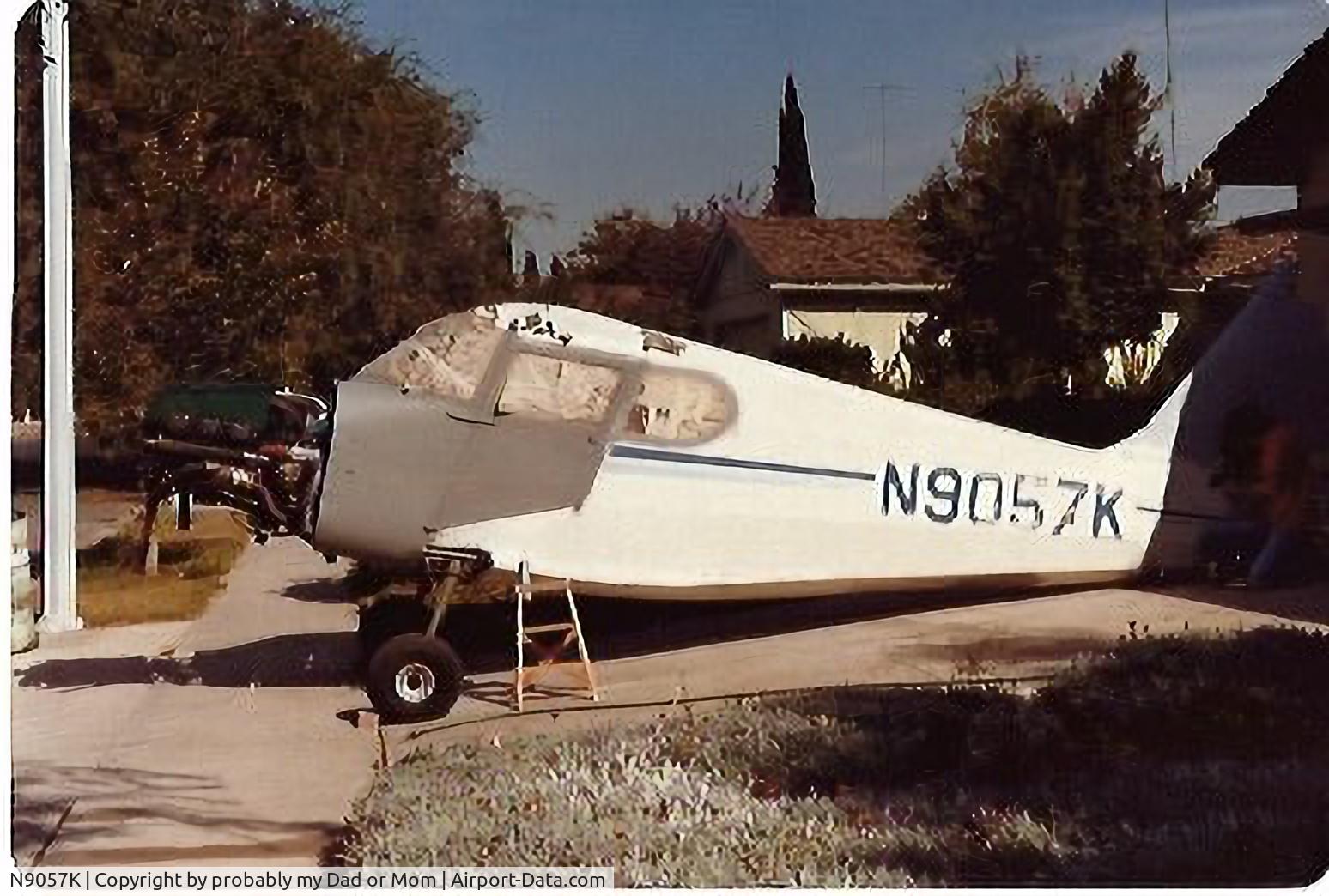 N9057K, 1947 Stinson 108-1 Voyager C/N 108-2057, My Dad (Dan Cork Sr.) completely rebuild this aircraft in his garage and driveway where the photo is taken. Long Beach Ca. I was just 3 years old at the time but still remember flying in it with my two older sisters. The final color was original red.