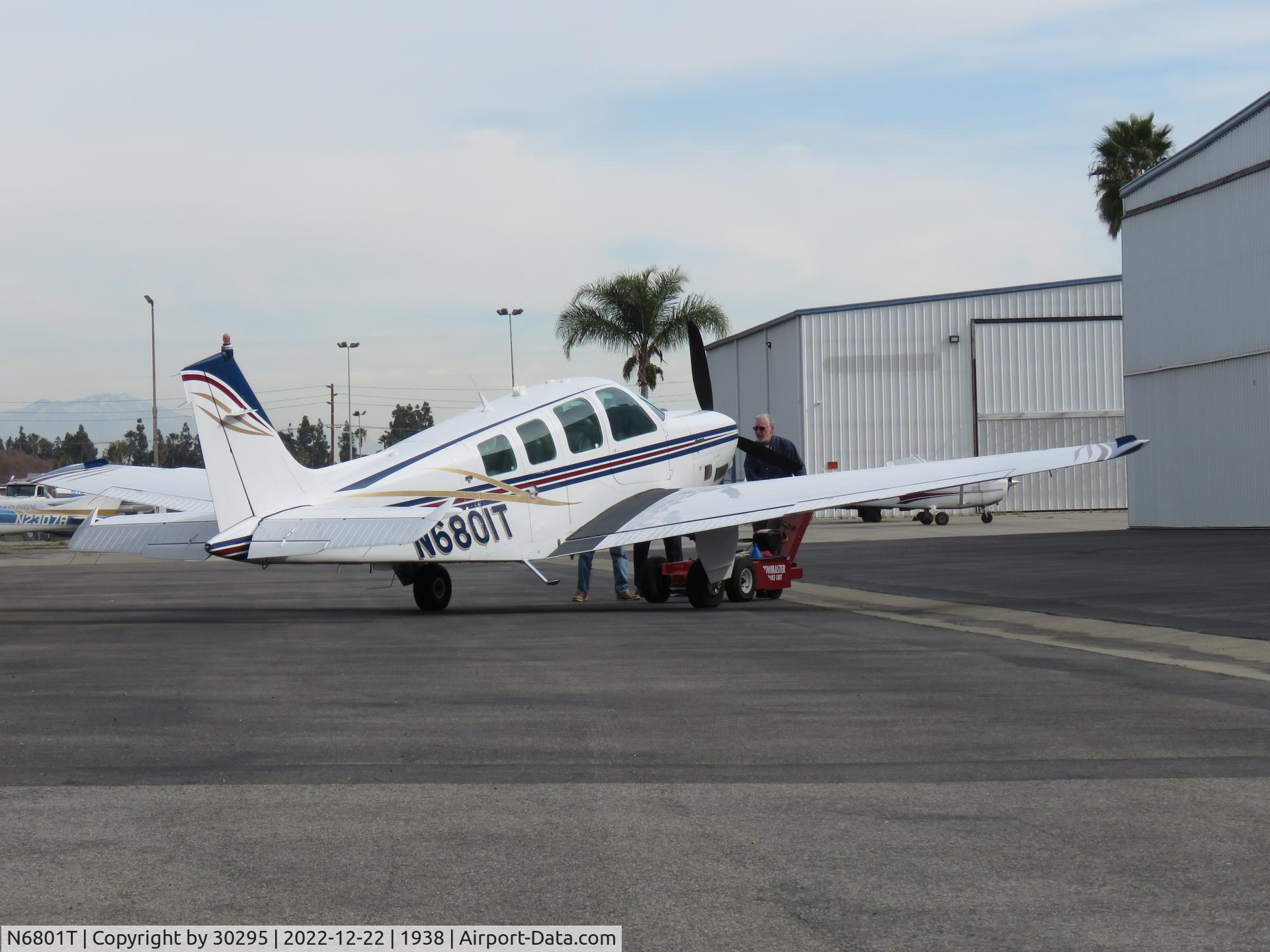 N6801T, 1984 Beech B36TC Bonanza C/N EA-429, Being put in a hanger