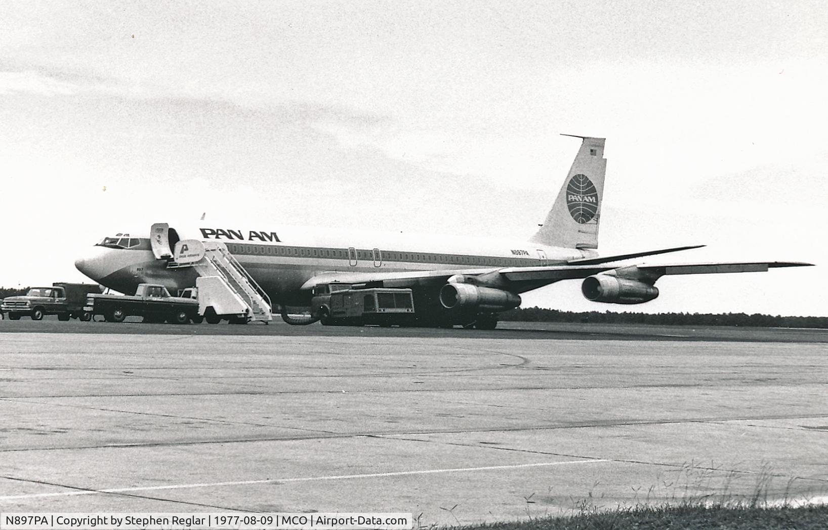 N897PA, 1969 Boeing 707-321B C/N 20034, Scanned print of Clipper Ocean Express B707-321B of PanAm being prepared for a MATS Charter flight Orlando-Frankfurt Rhein-Mein