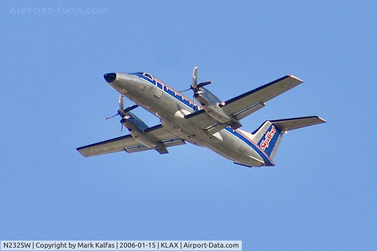 N232SW, 1995 Embraer EMB-120ER Brasilia C/N 120306, SkyWest United Express Embraer EMB-120ER Brasilia, N232SW departing 25R LAX