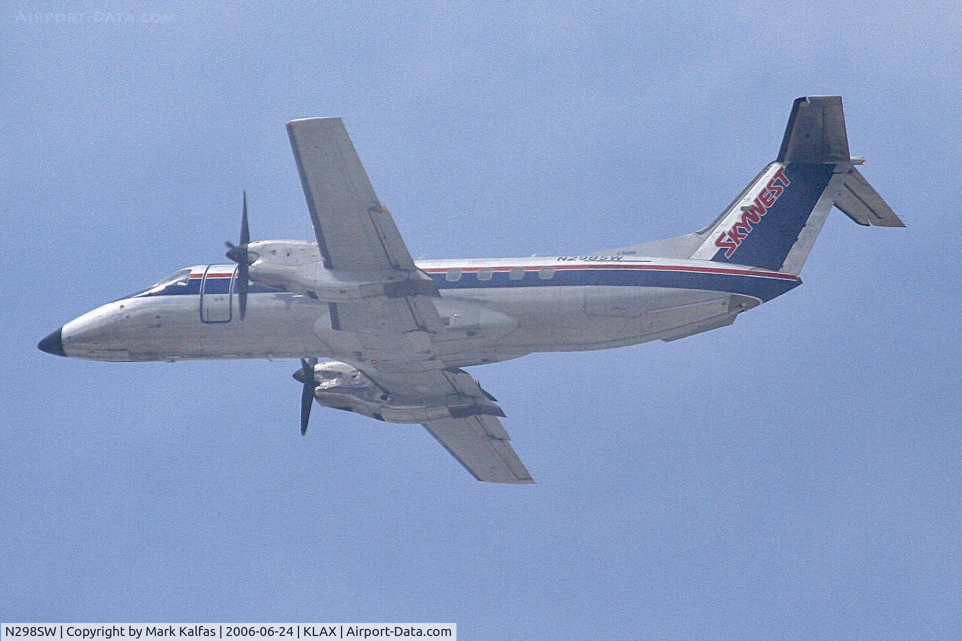 N298SW, 1996 Embraer EMB-120ER Brasilia C/N 120328, SkyWest Embraer EMB-120ER Brasilia, N298SW departing 25R KLAX