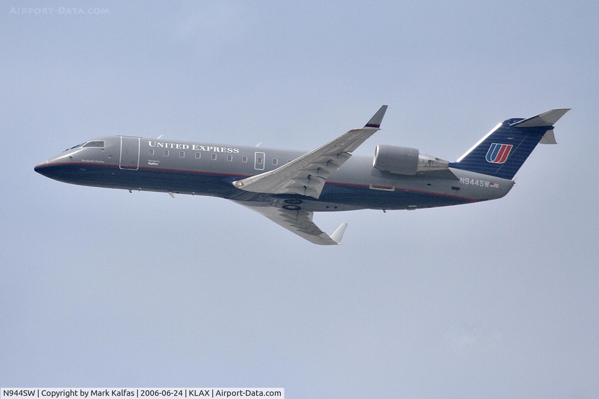 N944SW, 2003 Bombardier CRJ-200LR (CL-600-2B19) C/N 7764, SkyWest/United Express Bombardier CRJ-200LR (CL-600-2B19), N944SW departing 25R LAX