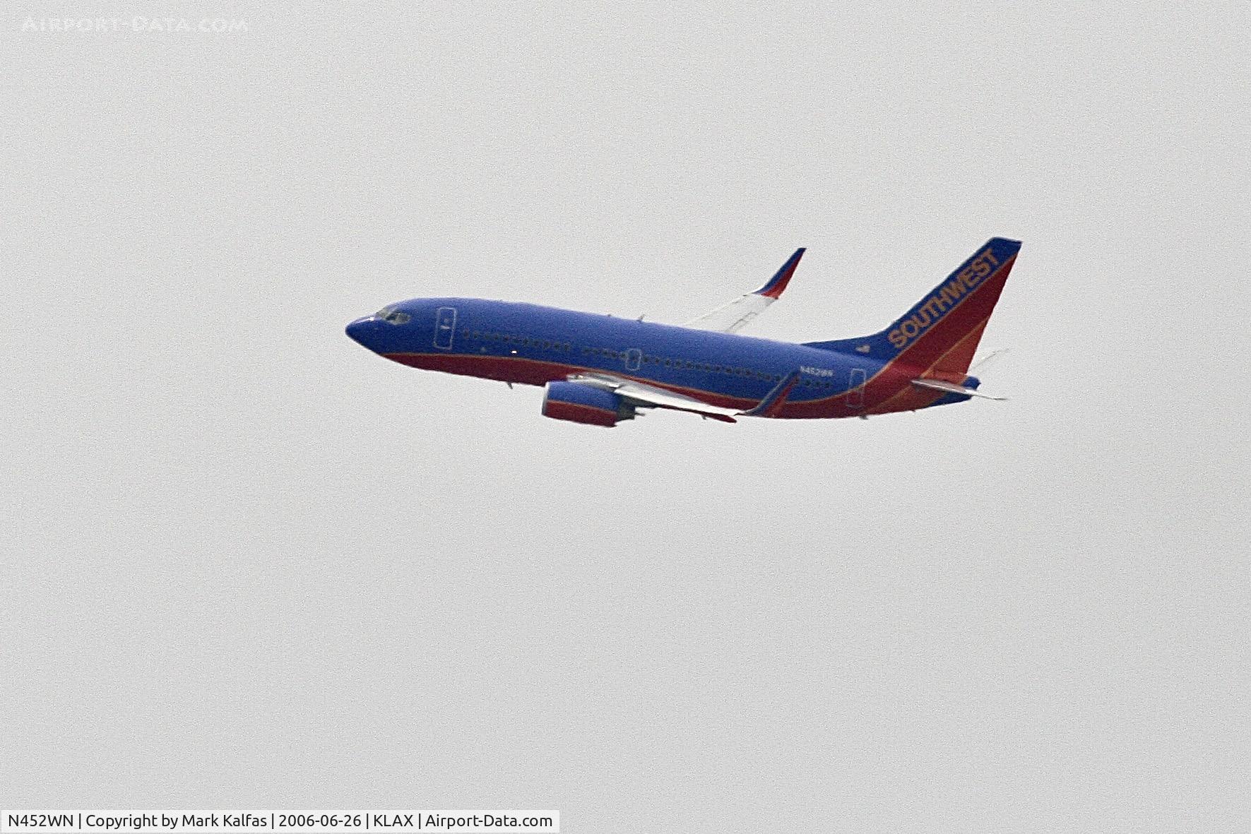 N452WN, 2004 Boeing 737-7H4 C/N 29846, SOUTHWEST Boeing 737-7H4, N452WN departing 24L LAX