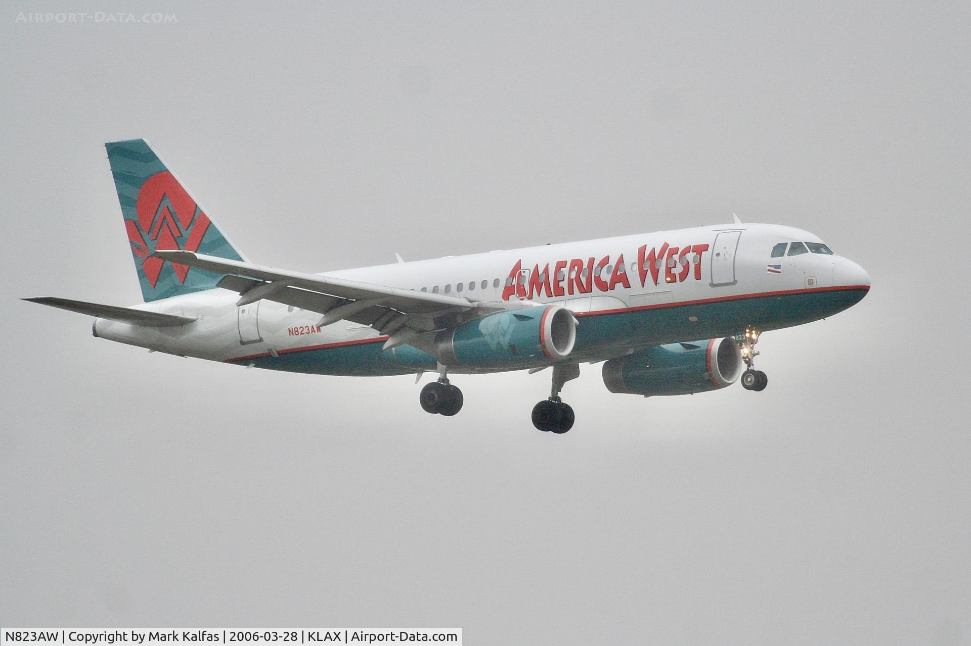 N823AW, 2001 Airbus A319-132 C/N 1463, America West Airbus A319-132, N823AW on a stormy approach 7R LAX.