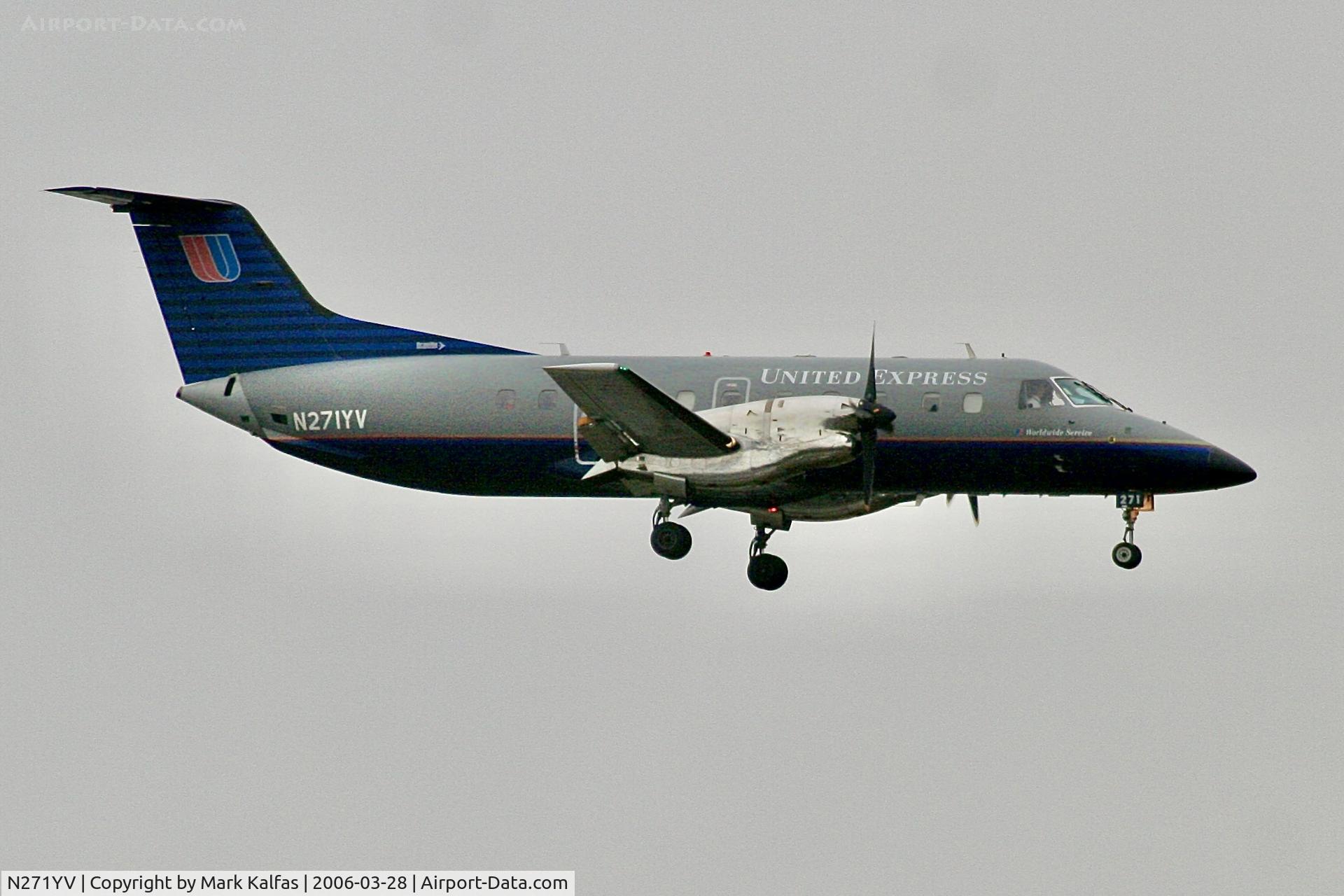 N271YV, 1993 Embraer EMB-120ER Brasilia C/N 120271, SkyWest/United Express Embraer EMB-120ER, N271YV on a stormy approach to runway 7R LAX