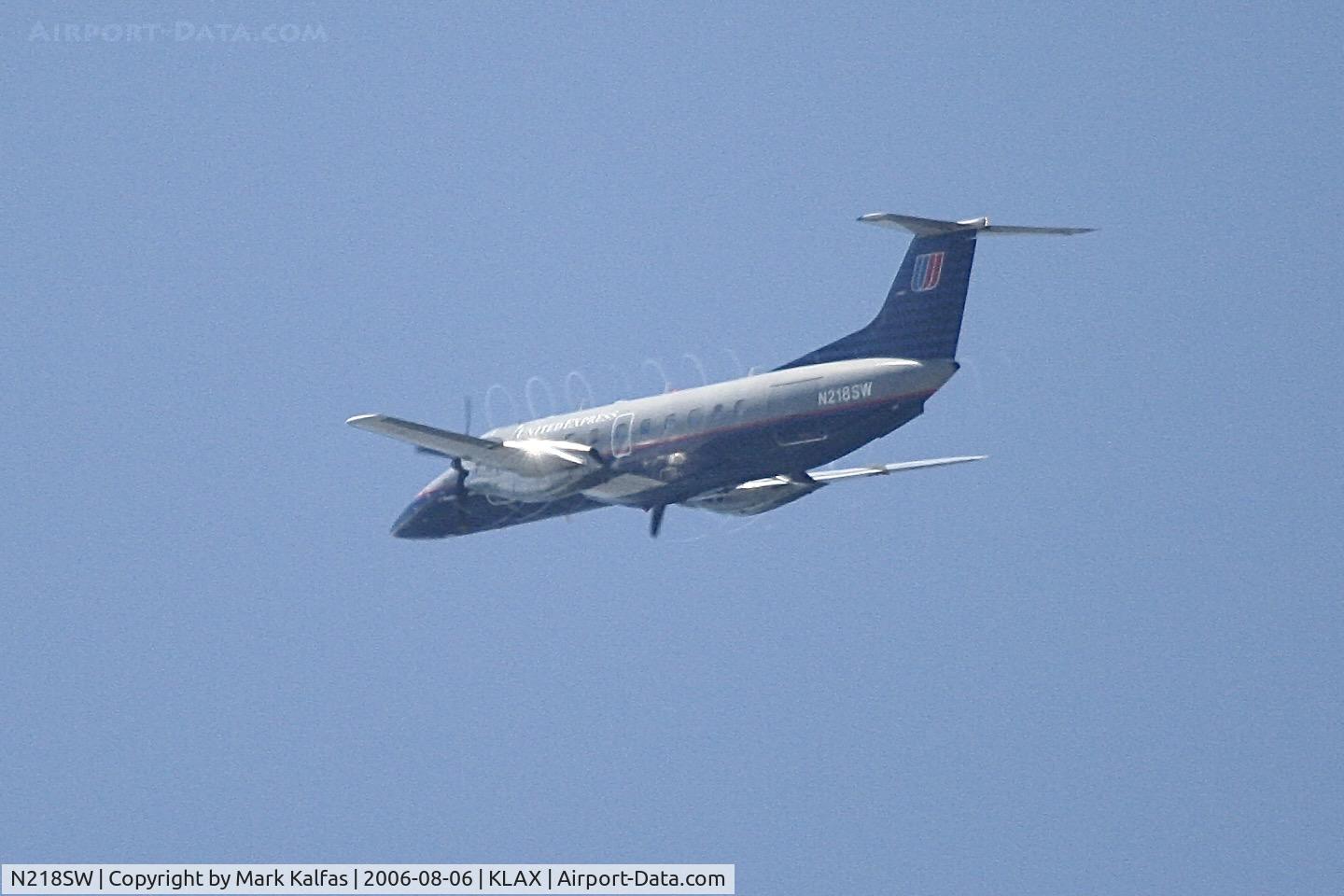 N218SW, 1994 Embraer EMB-120ER Brasilia C/N 120.287, SkyWest/United Express Embraer EMB-120ER Brasilia, N213SW departing 25R LAX