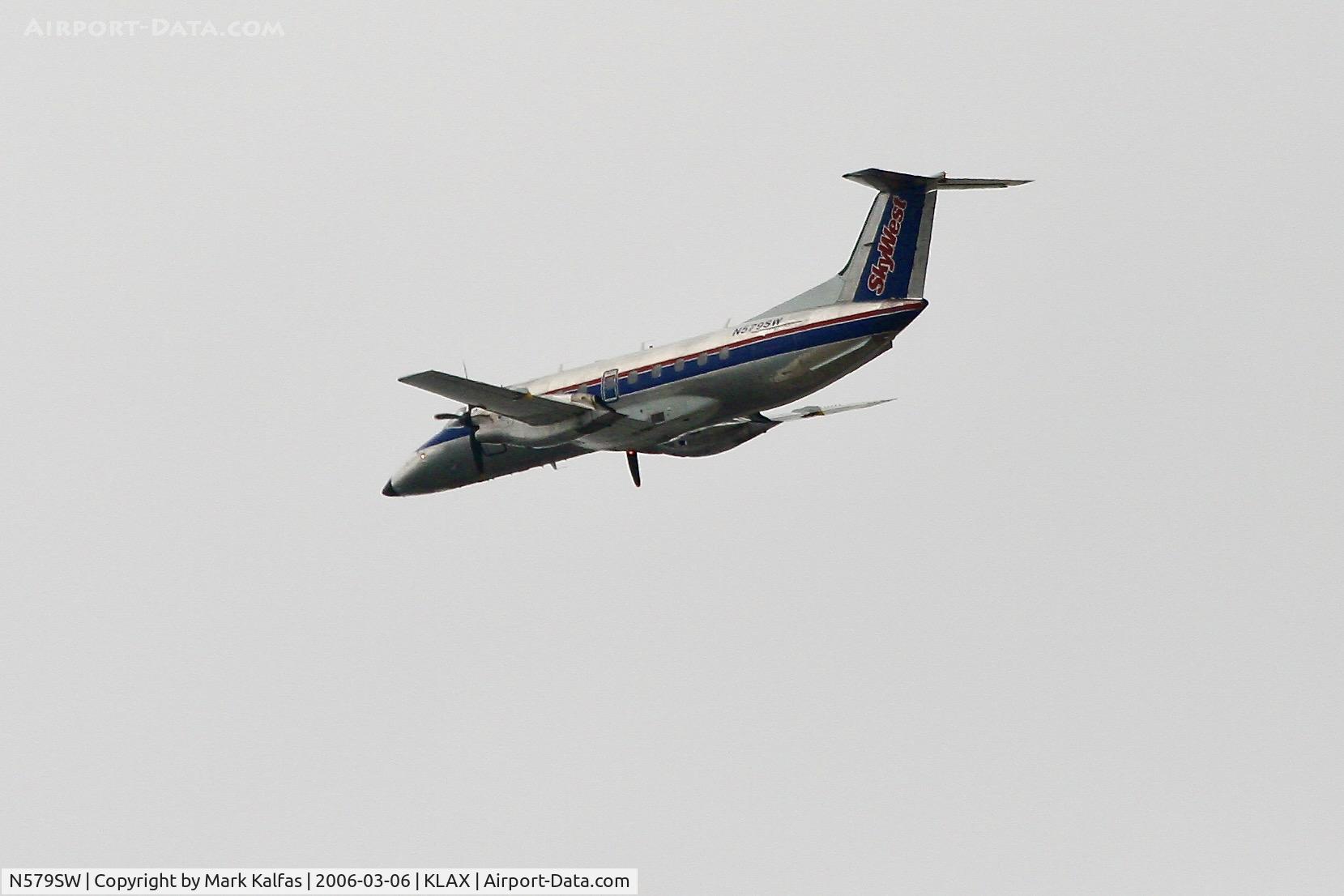 N579SW, 1998 Embraer EMB-120ER Brasilia C/N 120347, SkyWest/United Express Embraer EMB-120ER Brasilia N579SW departing 25R LAX