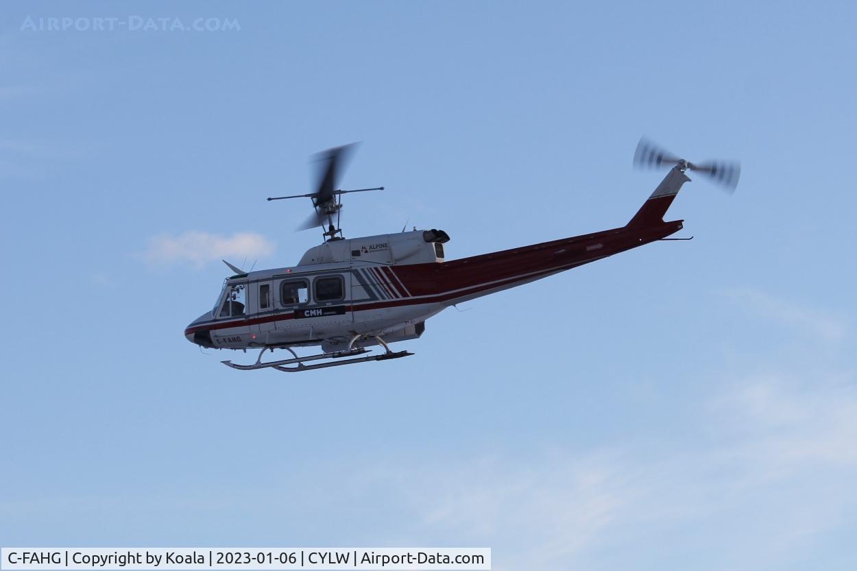 C-FAHG, Bell 212 C/N 30940, Flying around the airport.