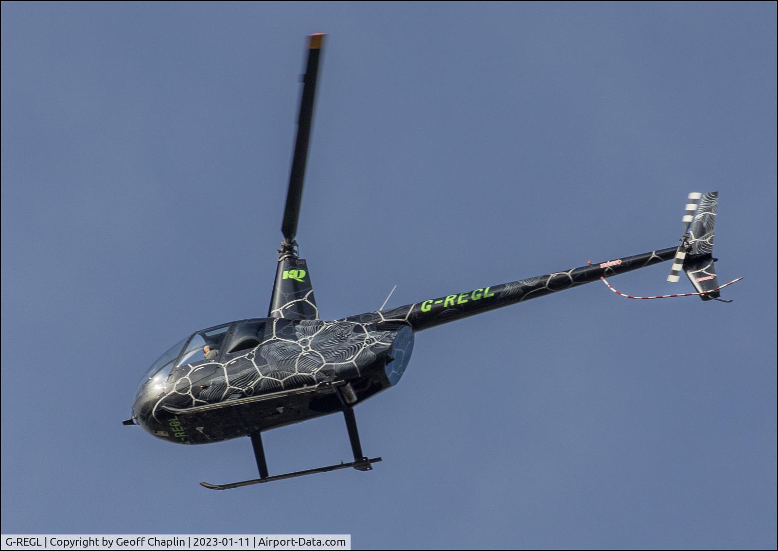 G-REGL, 2003 Robinson R44 Raven II C/N 10235, Taken over Stockers Lake in Rickmansworth on Wed 11 Jan 23