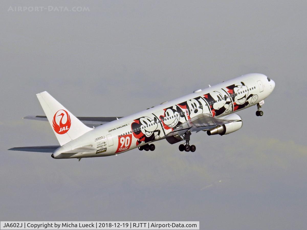 JA602J, 2002 Boeing 767-346/ER C/N 32887, Mickey Mouse climbing out of Haneda