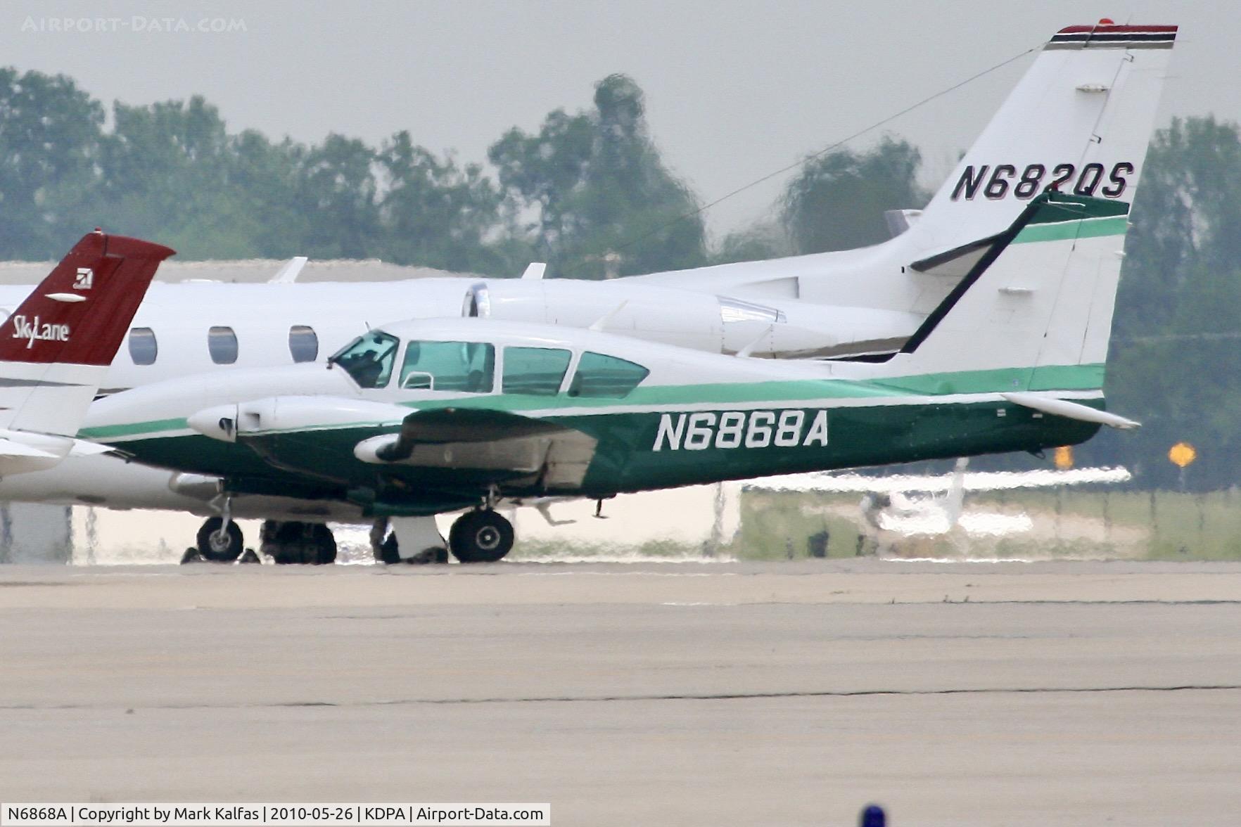 N6868A, 1979 Piper PA-23-250 C/N 27-7954101, Piper Aztec PA-23-250, N6868A on the ramp DPA