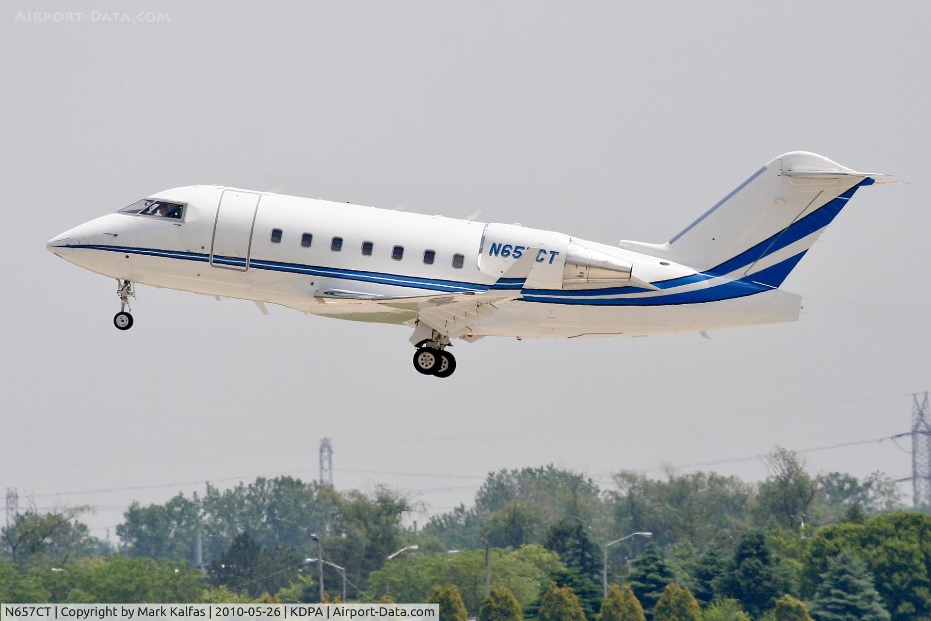 N657CT, 2006 Bombardier Challenger 604 (CL-600-2B16) C/N 5665, CATERPILLAR INC Bombardier Challenger 604, N657CT departing 2L DPA