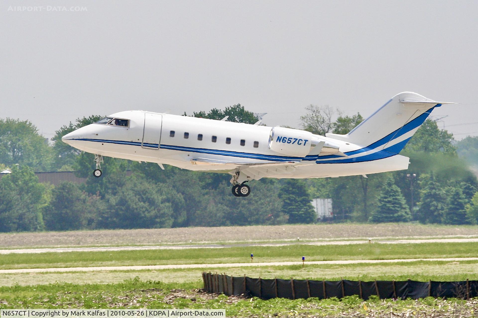 N657CT, 2006 Bombardier Challenger 604 (CL-600-2B16) C/N 5665, CATERPILLAR INC Bombardier Challenger 604, N657CT departing 2L DPA