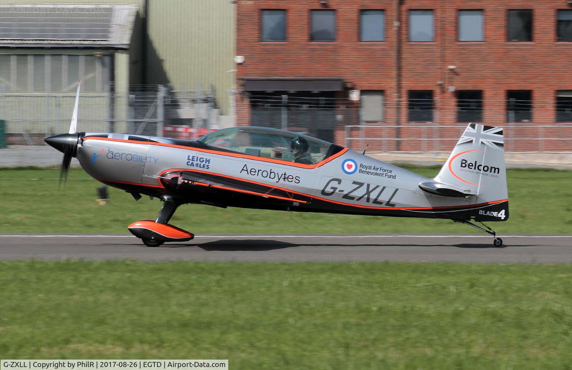 G-ZXLL, 2011 Extra EA-300L C/N 1319, G-ZXLL 2011 Extra EA 300L 'The Blades' Wings & Wheels Dunsfold