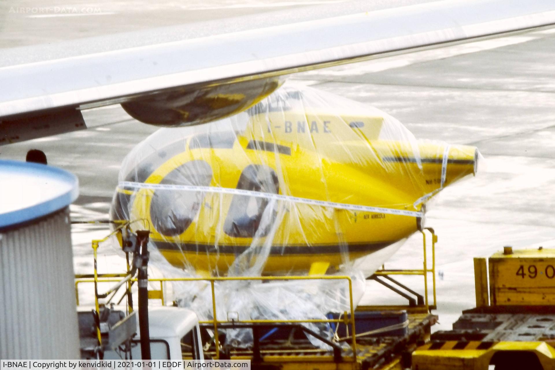 I-BNAE, Hughes 369D C/N 1160021D, Being loaded into a Varig Boeing 747 at Frankfurt, early 1980's.