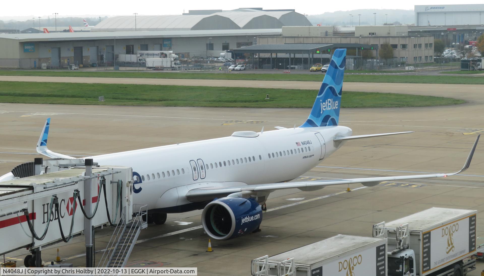 N4048J, 2021 Airbus A321-271NX C/N 10446, Parked at gate at London Gatwick
