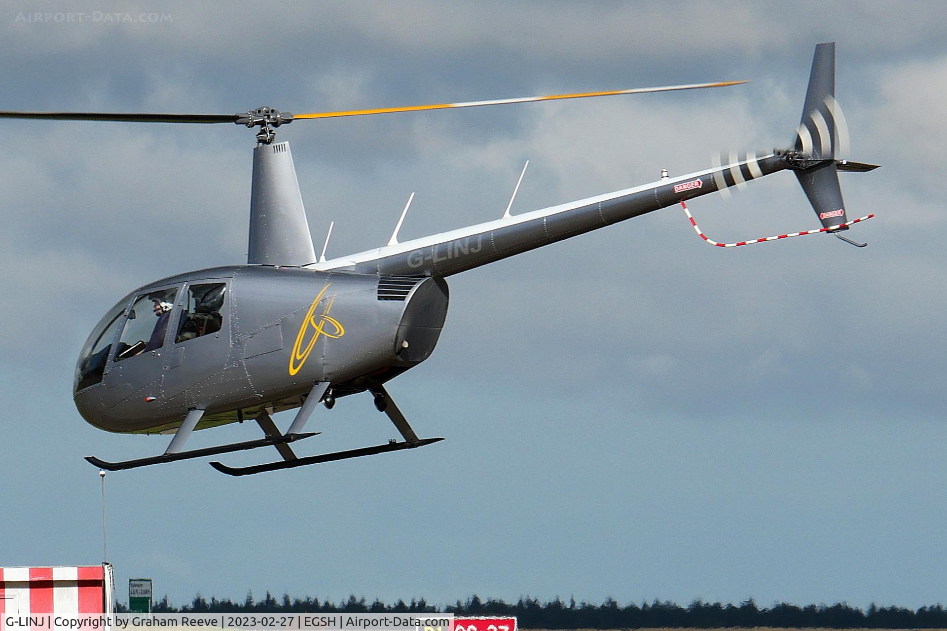 G-LINJ, 2008 Robinson R44 Raven II C/N 12168, Landing at Norwich.