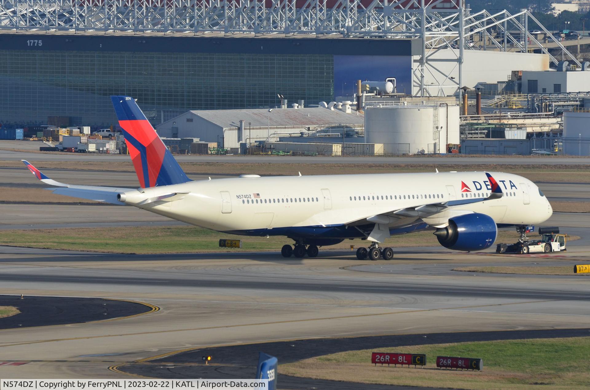 N574DZ, 2019 Airbus A350-941 C/N 265, Delta A359 under tow to gate