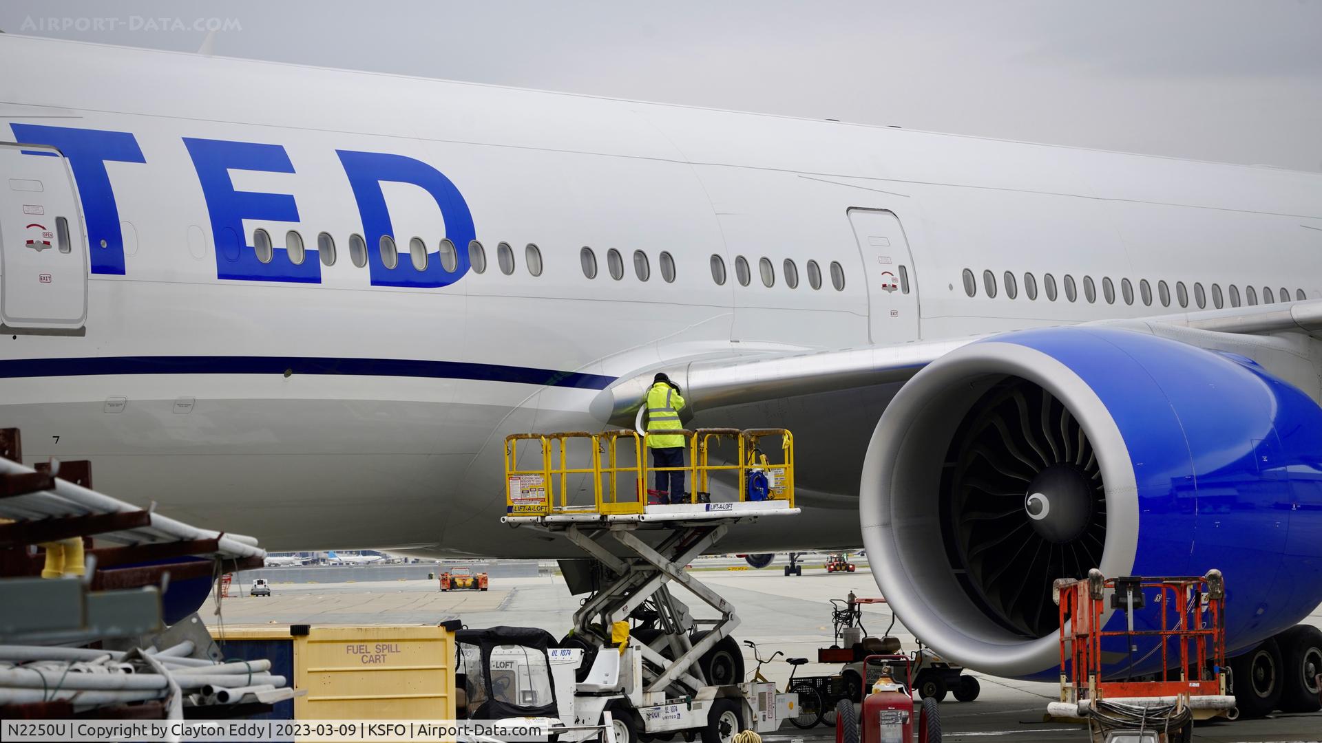 N2250U, 2019 Boeing 777-300/ER C/N 66590, Light bulb change. SFO 2023.