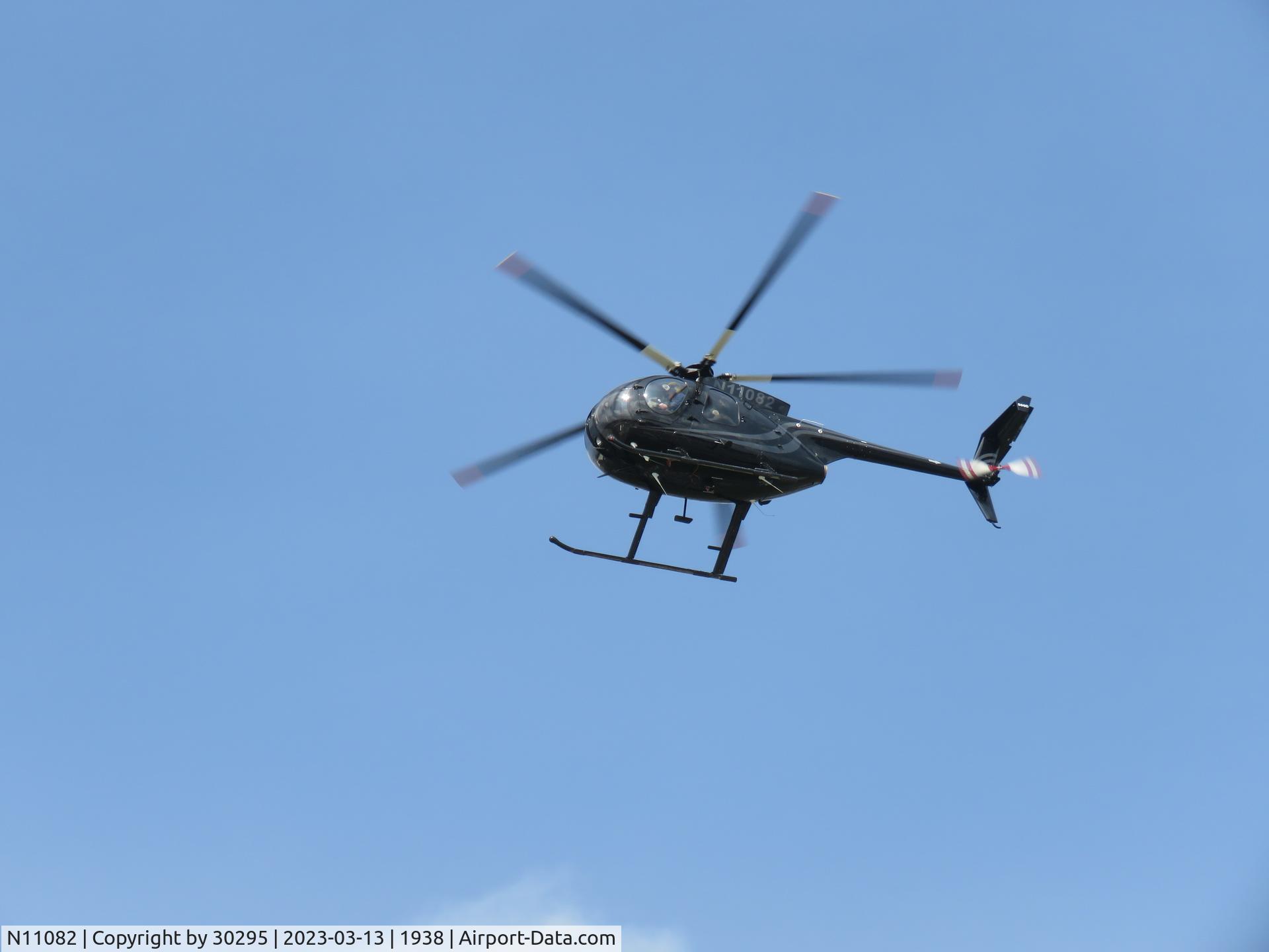 N11082, 1980 Hughes 500D (369D) C/N 1100845D, Going to helipad