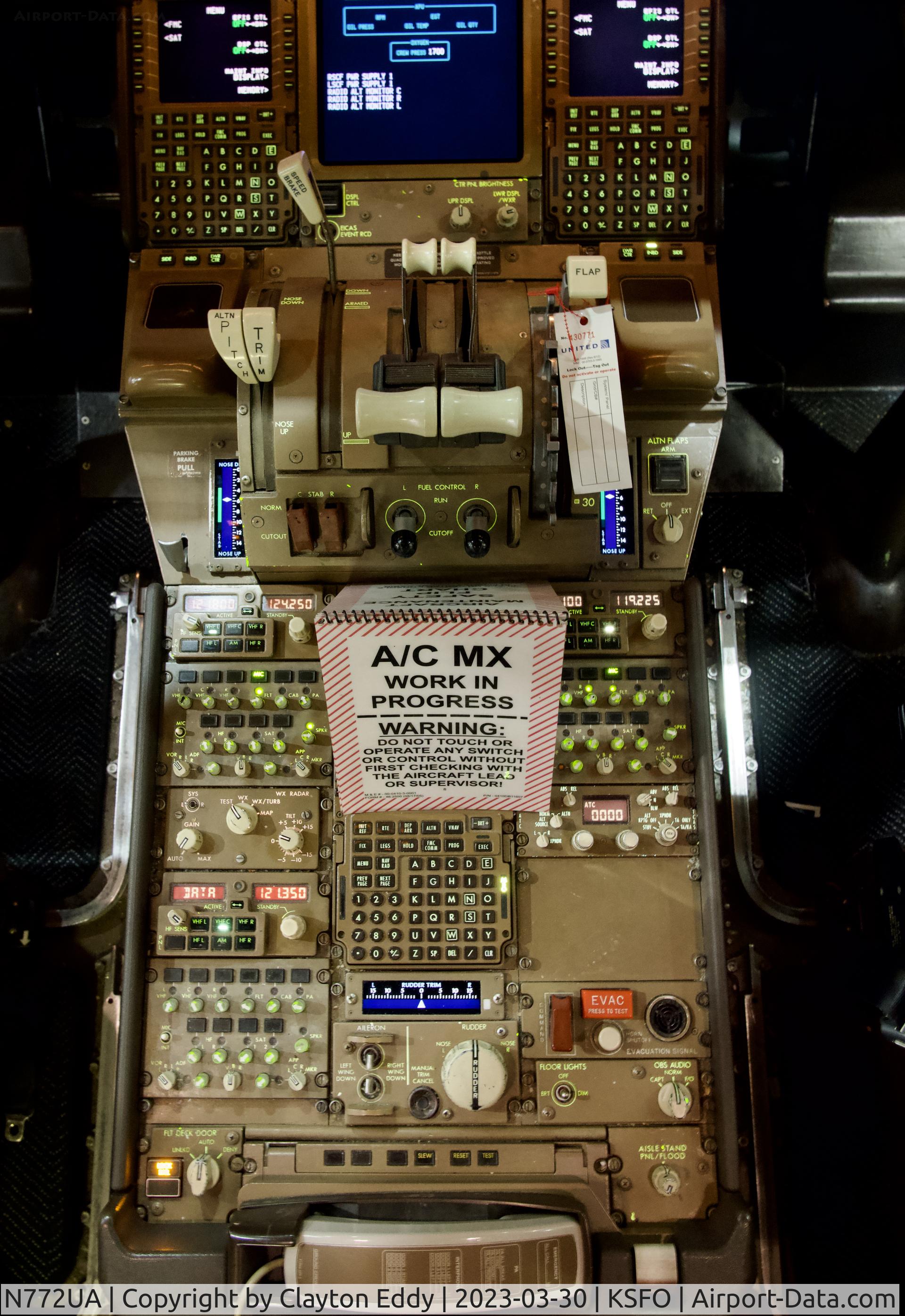 N772UA, 1995 Boeing 777-222 C/N 26930, Center pedestal SFO 2023.